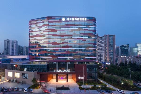 The jagged, crystalline exterior of Himalayas Qingdao Hotel designed by HASSELL, mimicking the rock formations of Mount Lao.