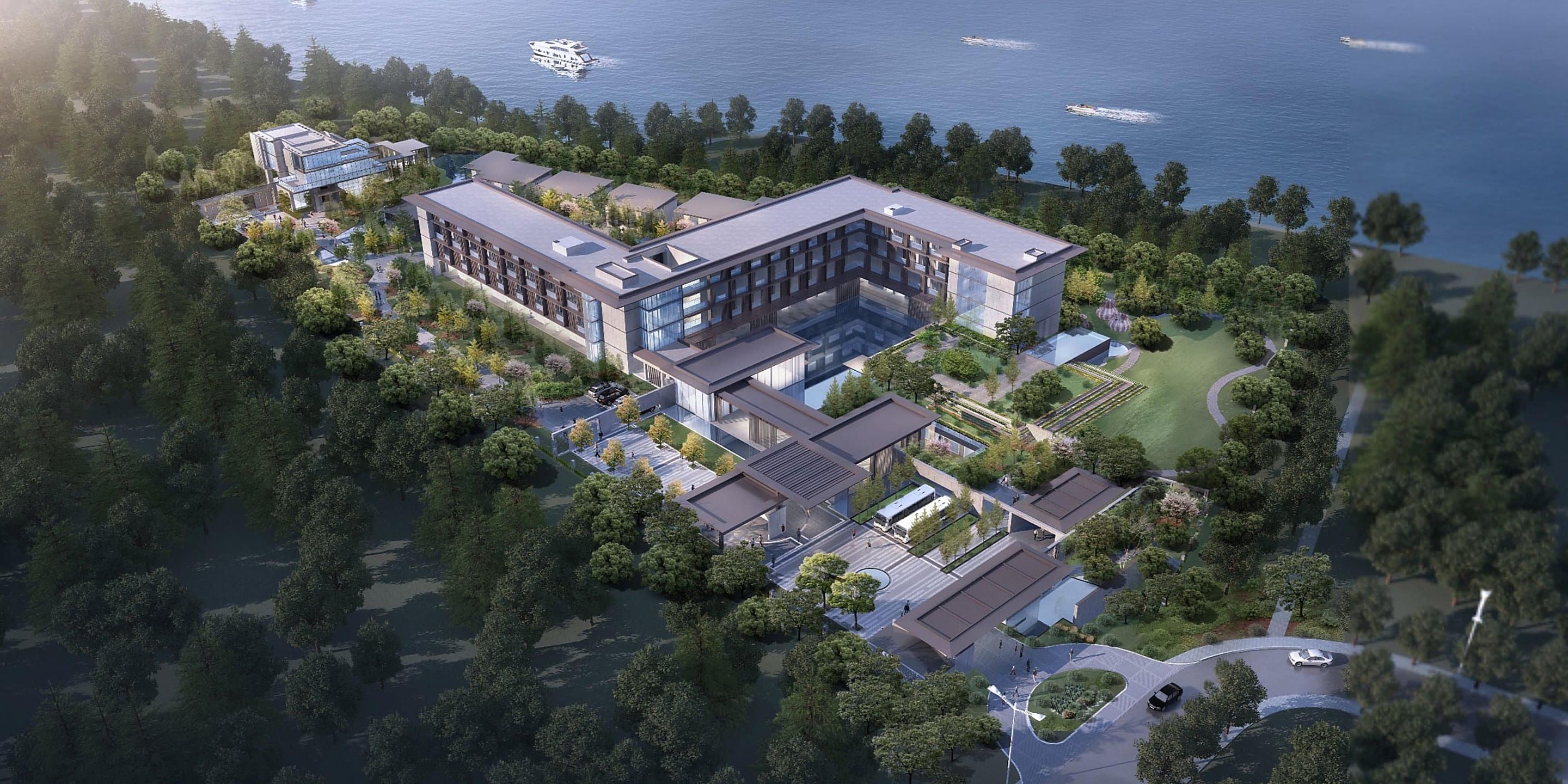 Lobby of Hotel Indigo Suzhou Yangcheng Lake featuring a stylized boat reception desk and golden brick textures.