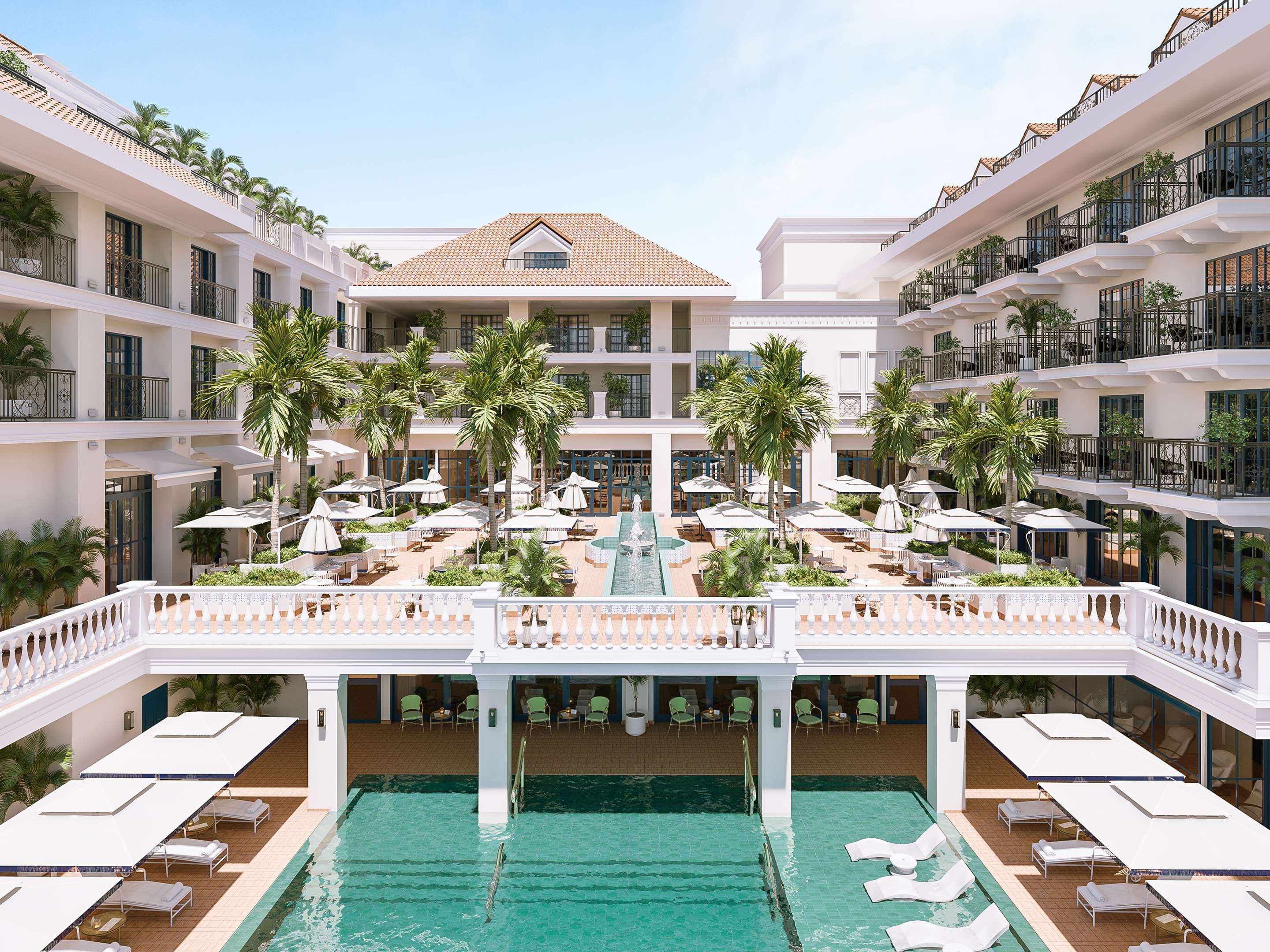 View of the Sofitel Legend Casco Viejo infinity pool overlooking the Pacific Ocean and Panama City skyline.