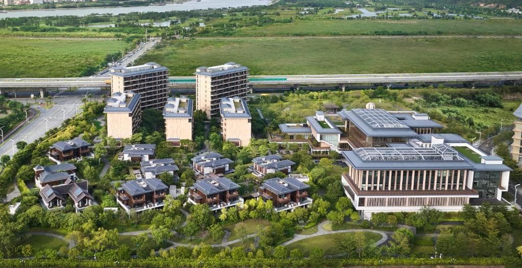 Luxurious room interior at Angsana Zhuhai Hengqin with premium amenities and large windows.