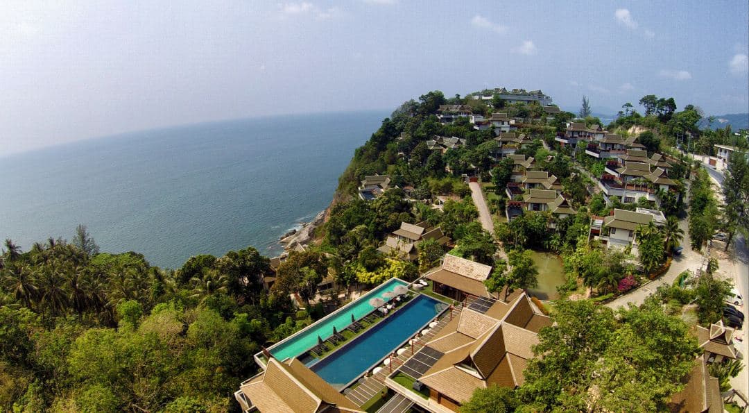 Ayara Kamala Infinity Pool Villa overlooking the Andaman Sea at sunset.