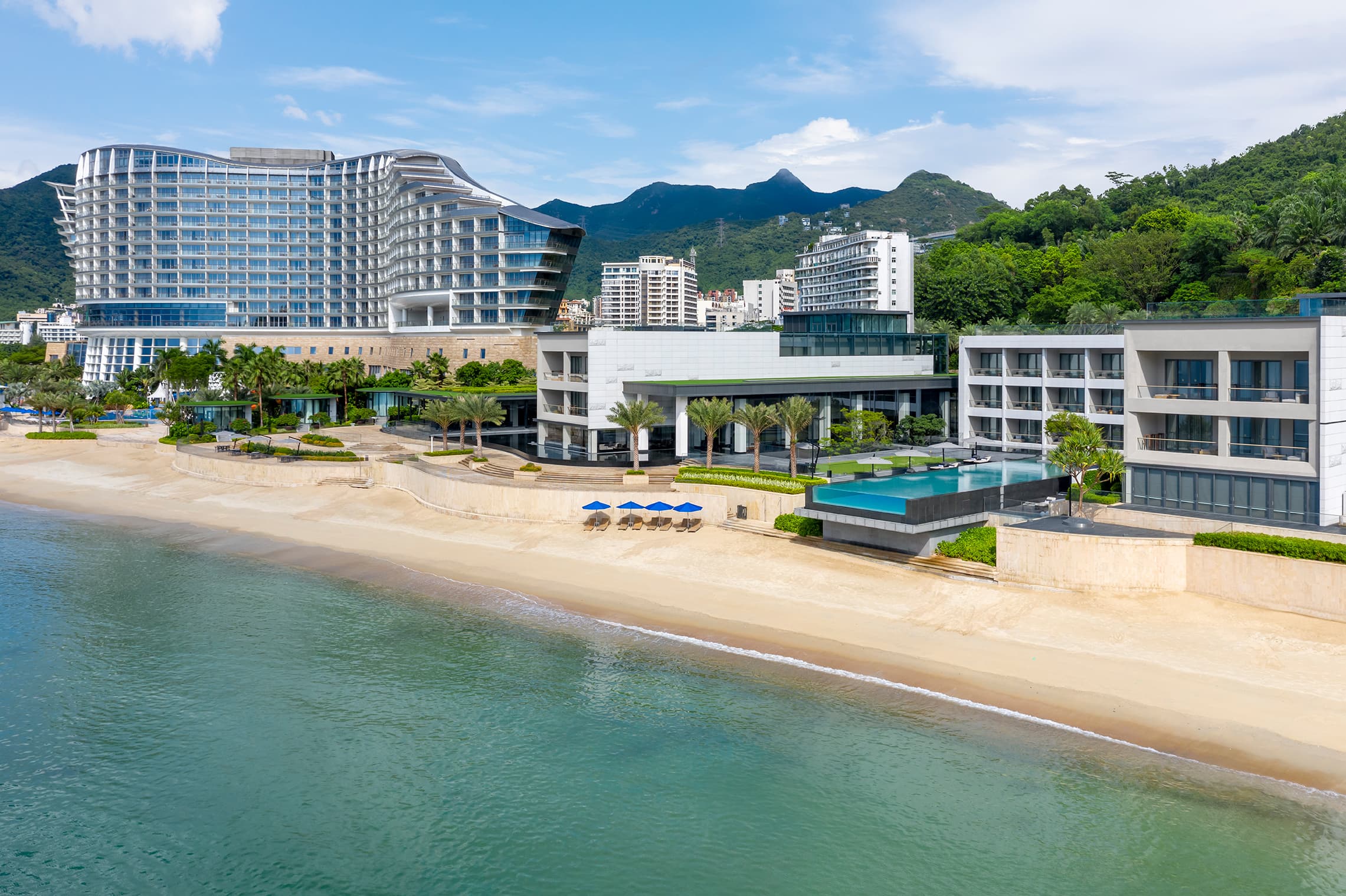 The cantilevered 'Glass Box' infinity pool at InterContinental Shenzhen Dameisha Resort overlooking the South China Sea.