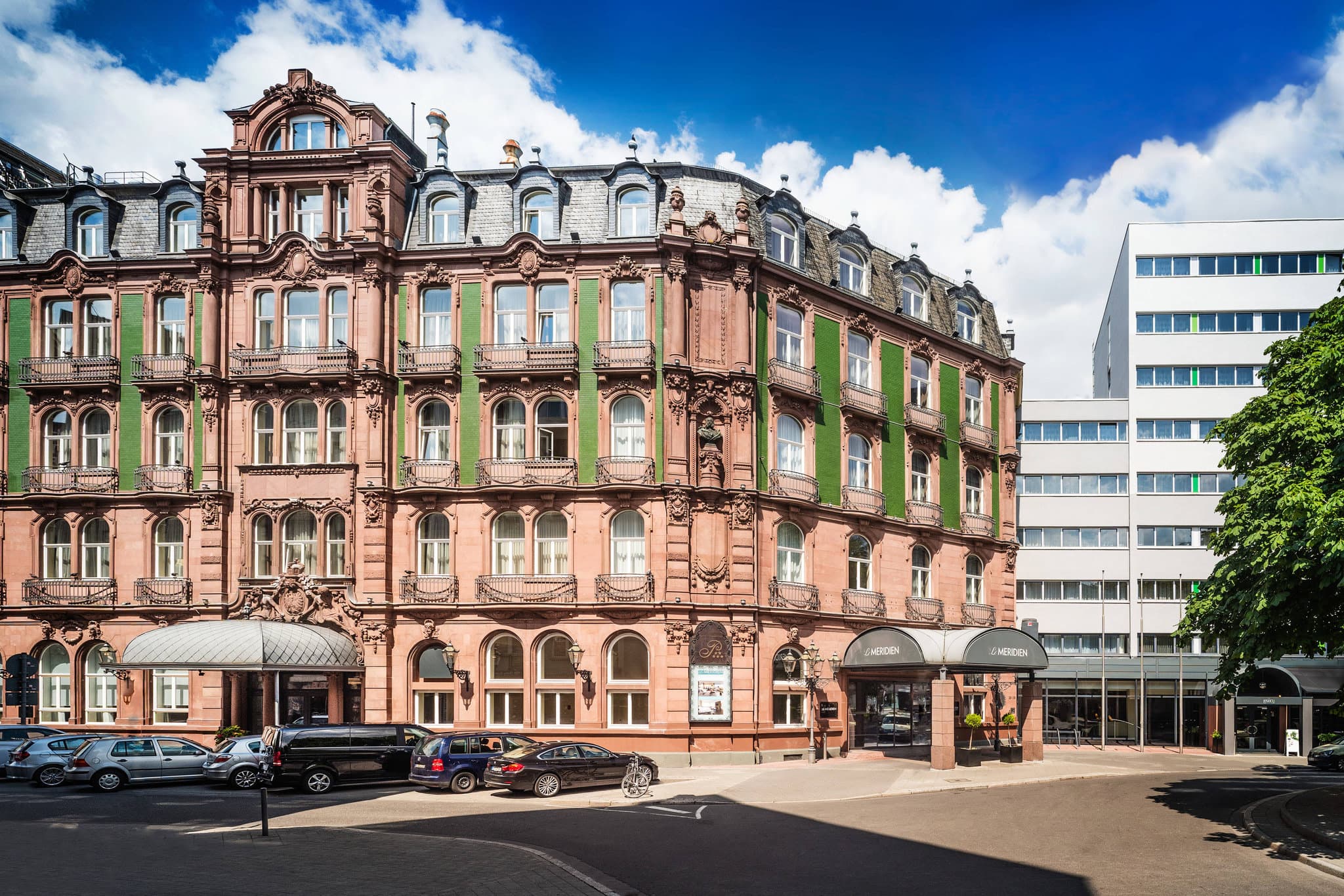 The Palais Staircase at Le Méridien Frankfurt featuring an Art Nouveau spiral design with elegant iron railings.