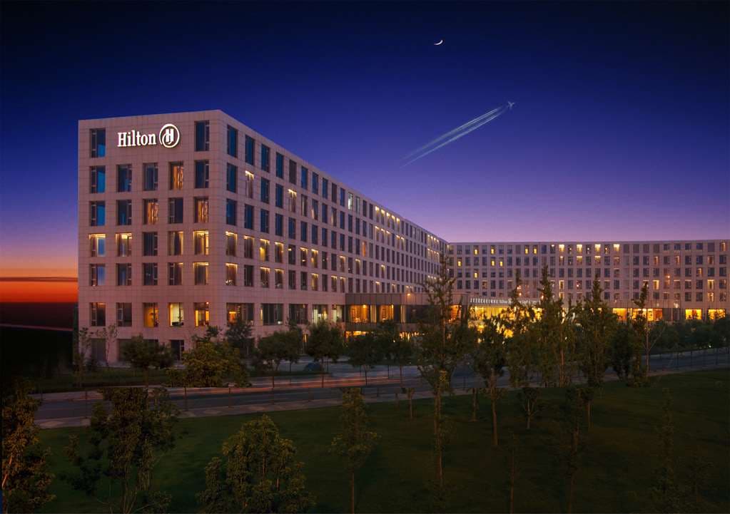 Hilton Beijing Capital Airport exterior with modern facade near Beijing Capital Airport