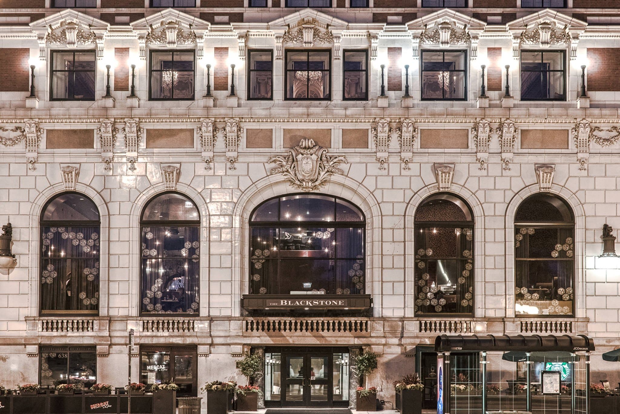 The Crystal Ballroom at The Blackstone Chicago featuring ornate crystal chandeliers and historic Beaux-Arts architectural detailing.