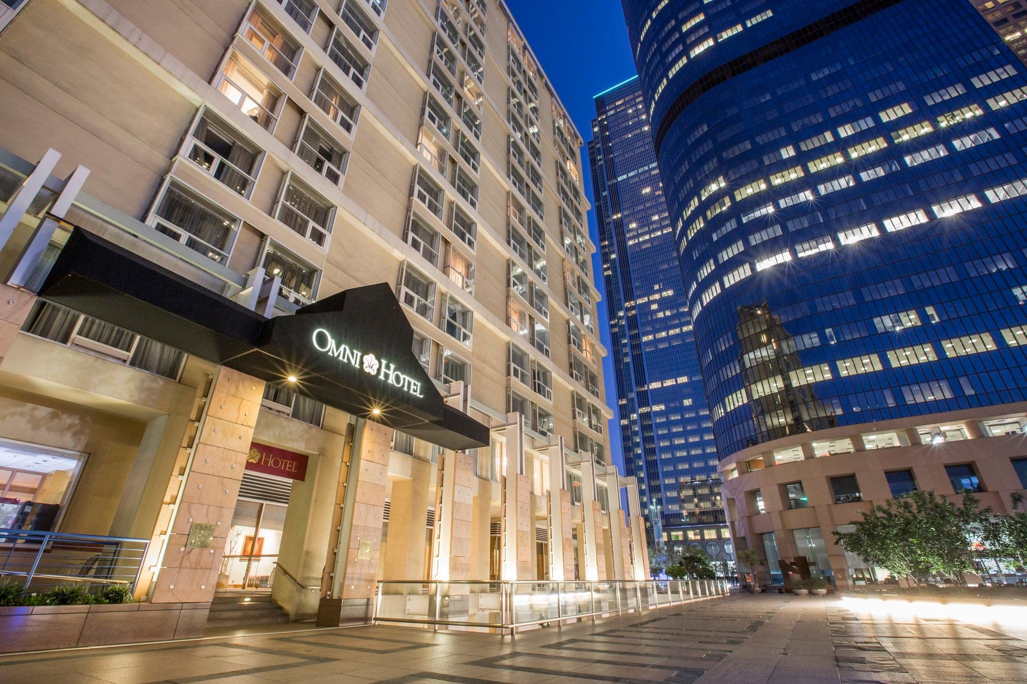 Omni Los Angeles outdoor heated lap pool on the 4th floor surrounded by downtown skyscrapers.