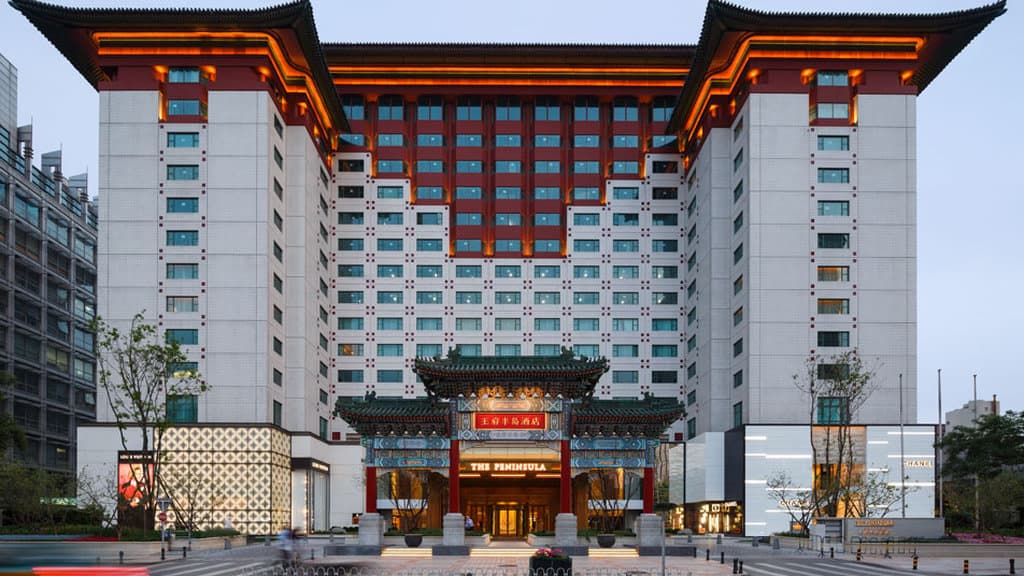 Elegant exterior of The Peninsula Beijing, a luxury hotel in central Beijing with grand entrance and refined design