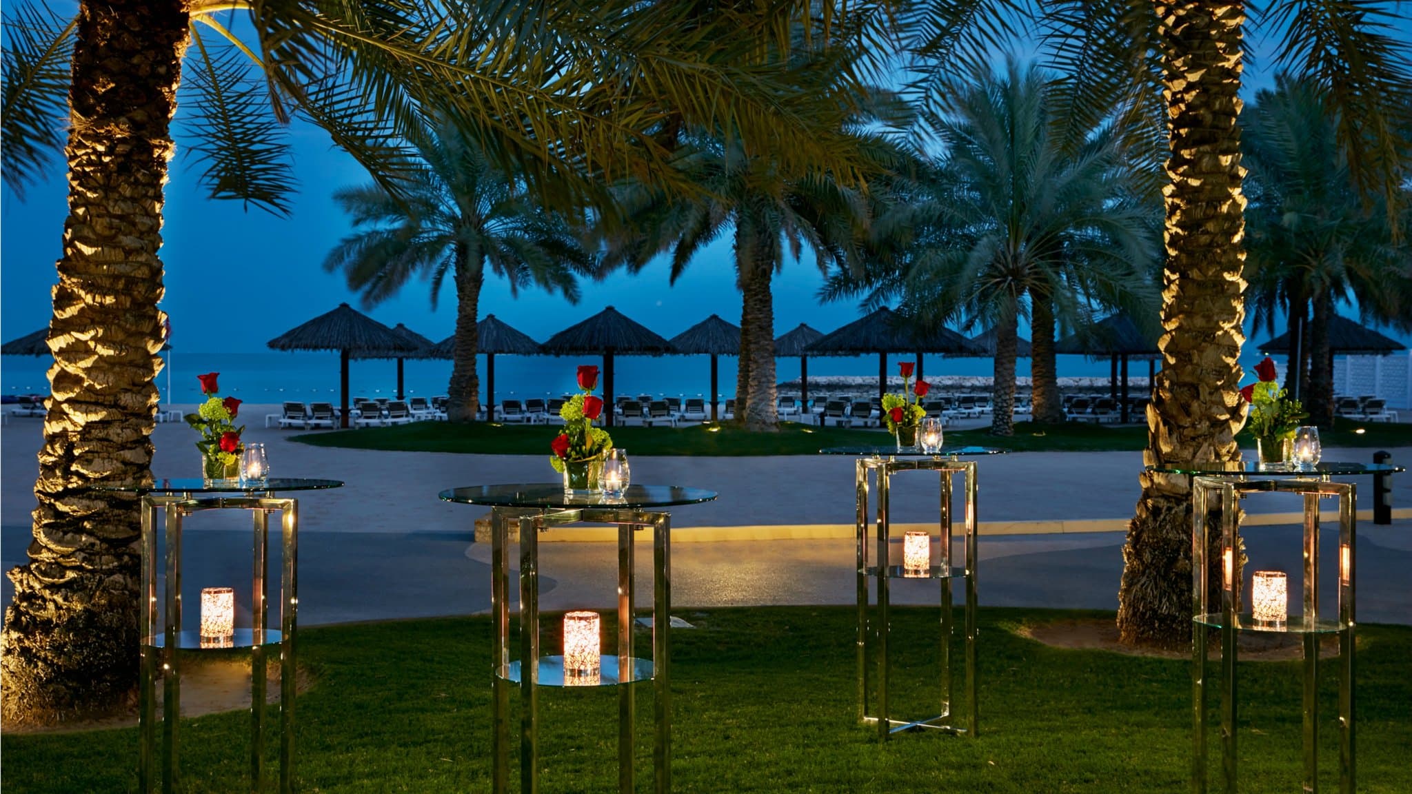 La Mar terrace at InterContinental Doha at sunset with views of the Doha skyline and West Bay.