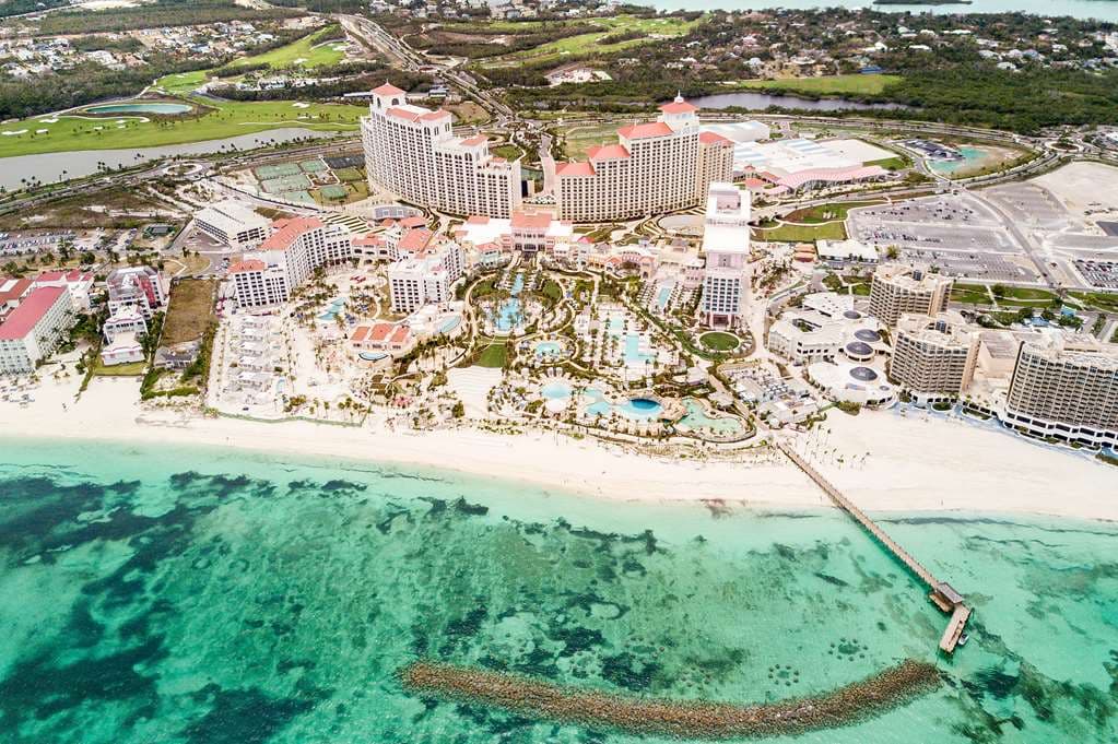 Grand Hyatt Baha Mar's Dean's Blue Hole pool with waterfalls and shark aquarium viewing area.