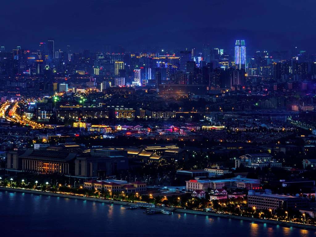 Exterior and luxurious lobby of the foreigner-friendly 5-star Sofitel Kunming hotel.