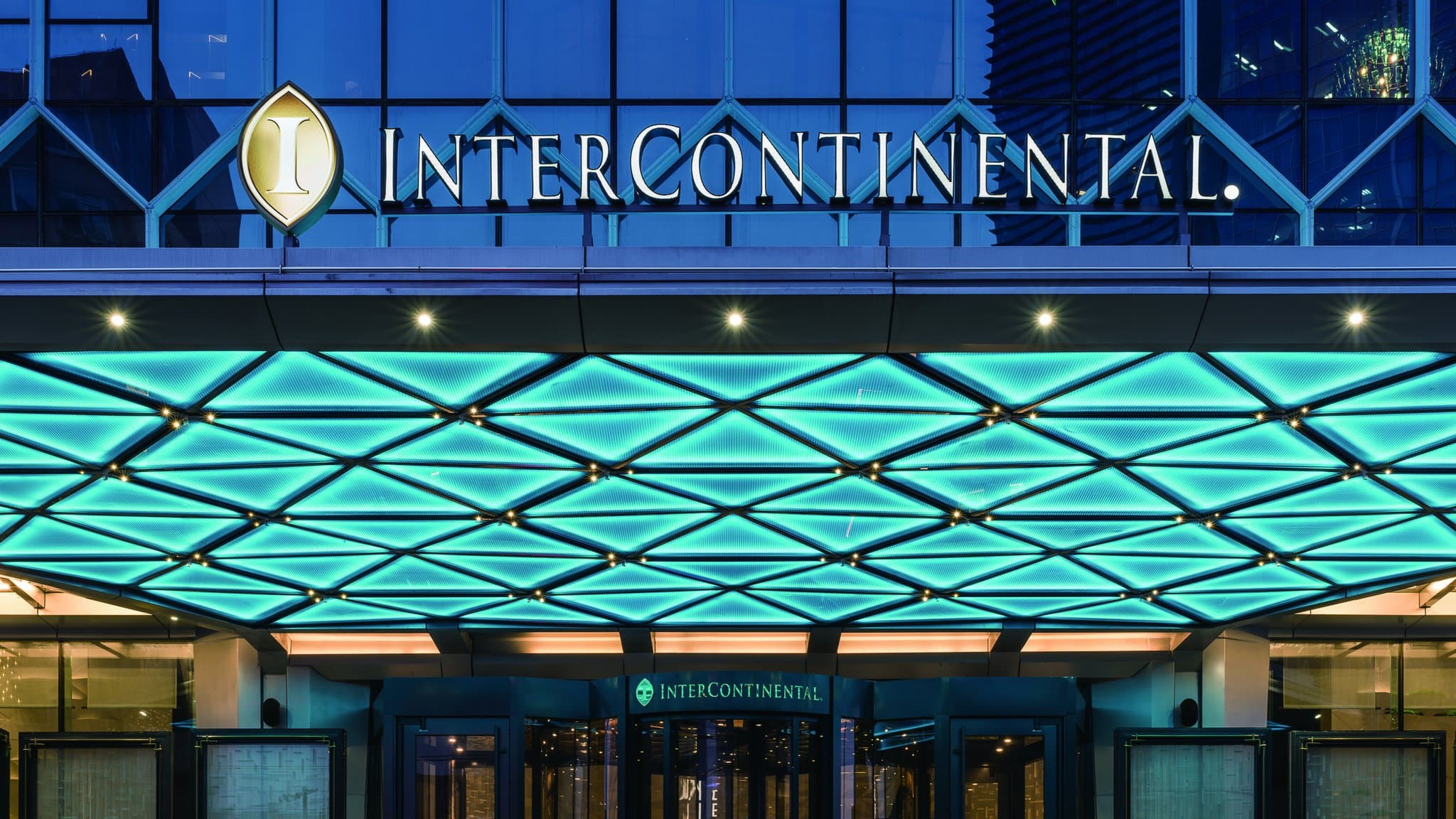 Luxurious modern facade of InterContinental Beijing Sanlitun hotel in China.