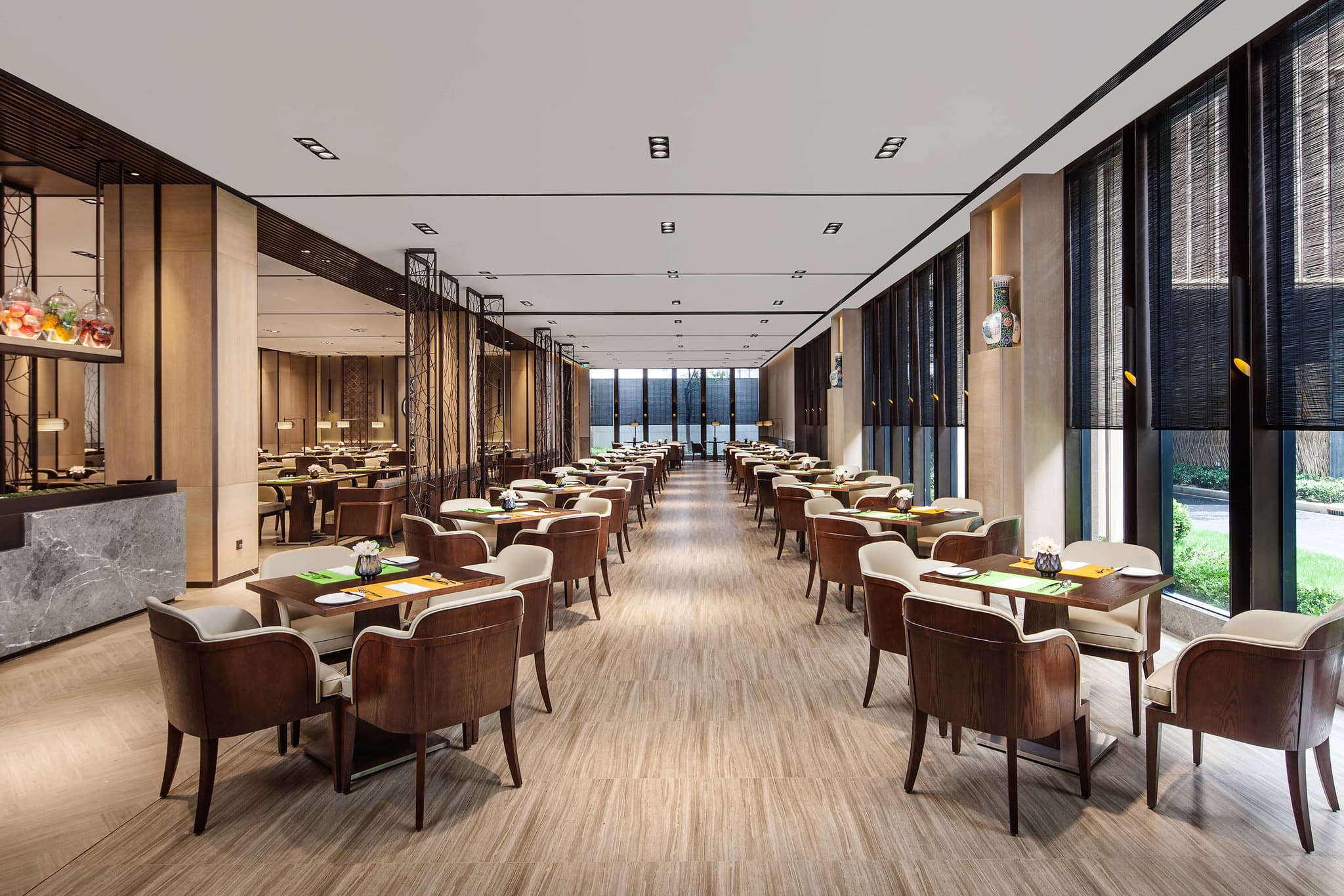 Exterior view of Courtyard Intl Tourism and Resorts Zone hotel in Shanghai with modern facade and driveway