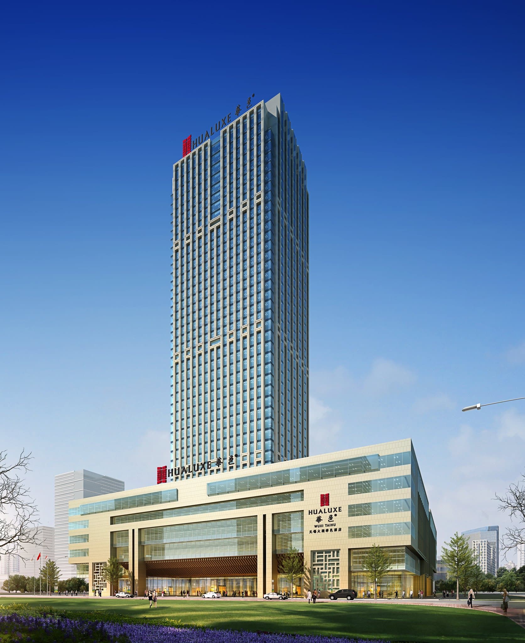 HUALUXE Wuxi Taihu 41st floor indoor swimming pool with floor-to-ceiling windows overlooking the city skyline at dusk.