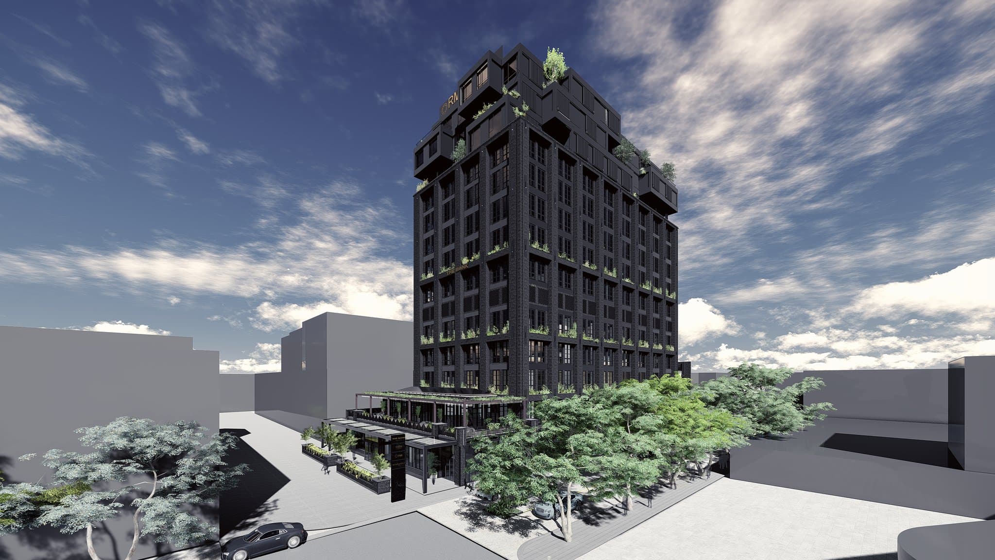 The dark, industrial-chic exterior of Hyde Johannesburg Rosebank, known as 'The Bank', contrasted against the green canopy of the city.