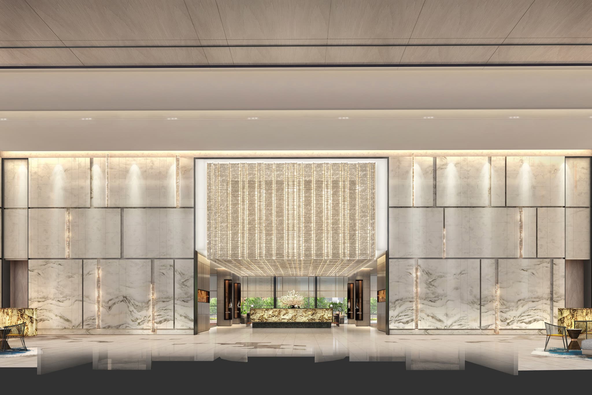Low angle view of the Sheraton Guangzhou Panyu lobby featuring a cascading crystal chandelier and modern jewel-toned seating.