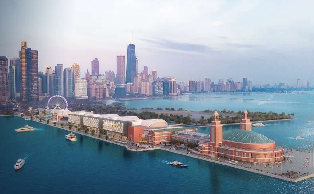 View from a Sable at Navy Pier hotel room featuring a window bench overlooking Lake Michigan and the Chicago skyline.