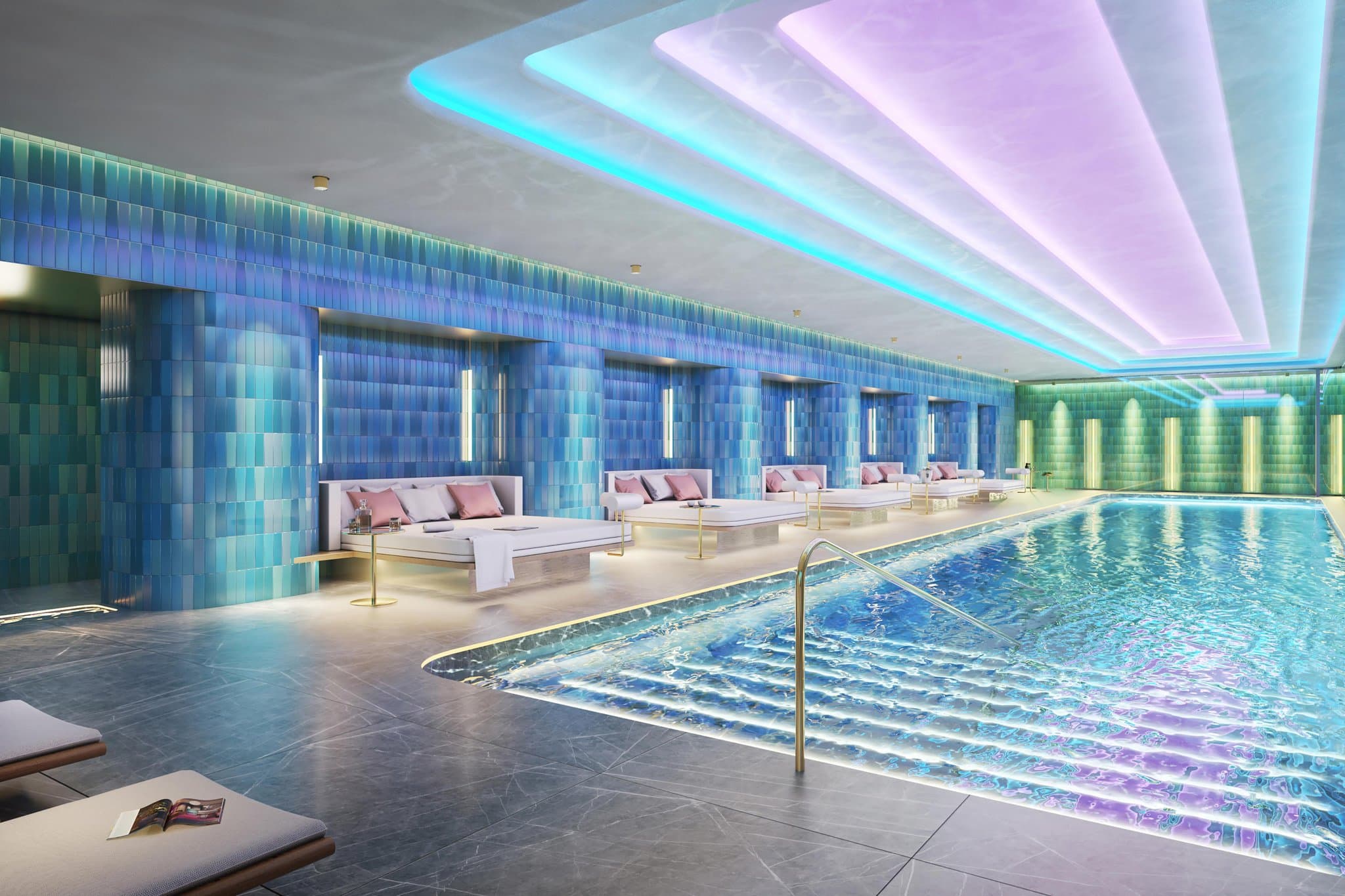 The futuristic 'Arrival Tunnel' at W Osaka featuring 3,000 laser-cut metal circles illuminated in shifting neon colors.