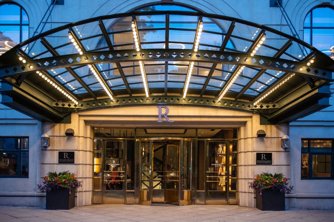 Lobby corridor featuring a 100-foot graffiti wall and modern lighting at Renaissance Philadelphia Downtown.