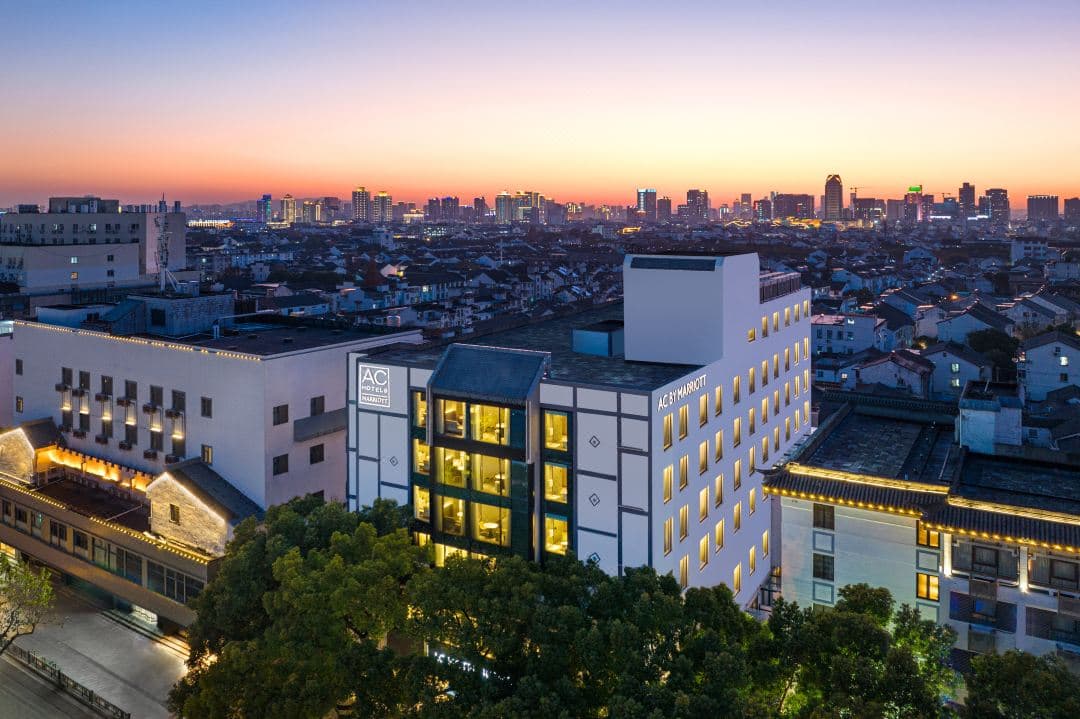 AC Hotel Suzhou China exterior with modern architecture near Jinji Lake and Suzhou International Expo Center