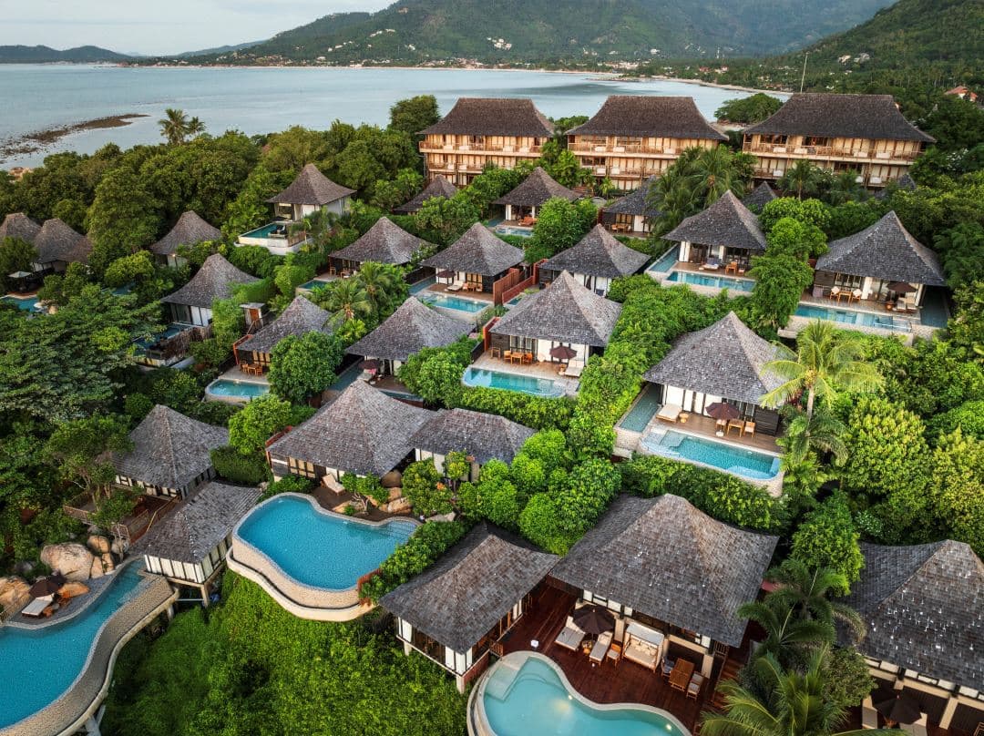 Silavadee Pool Spa Resort infinity pool cantilevered over massive granite boulders overlooking the Gulf of Thailand.