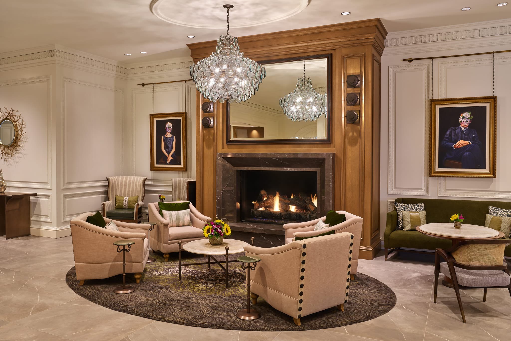 A guest room at The Whitley Atlanta featuring a bay window with skyline views and plush seating.
