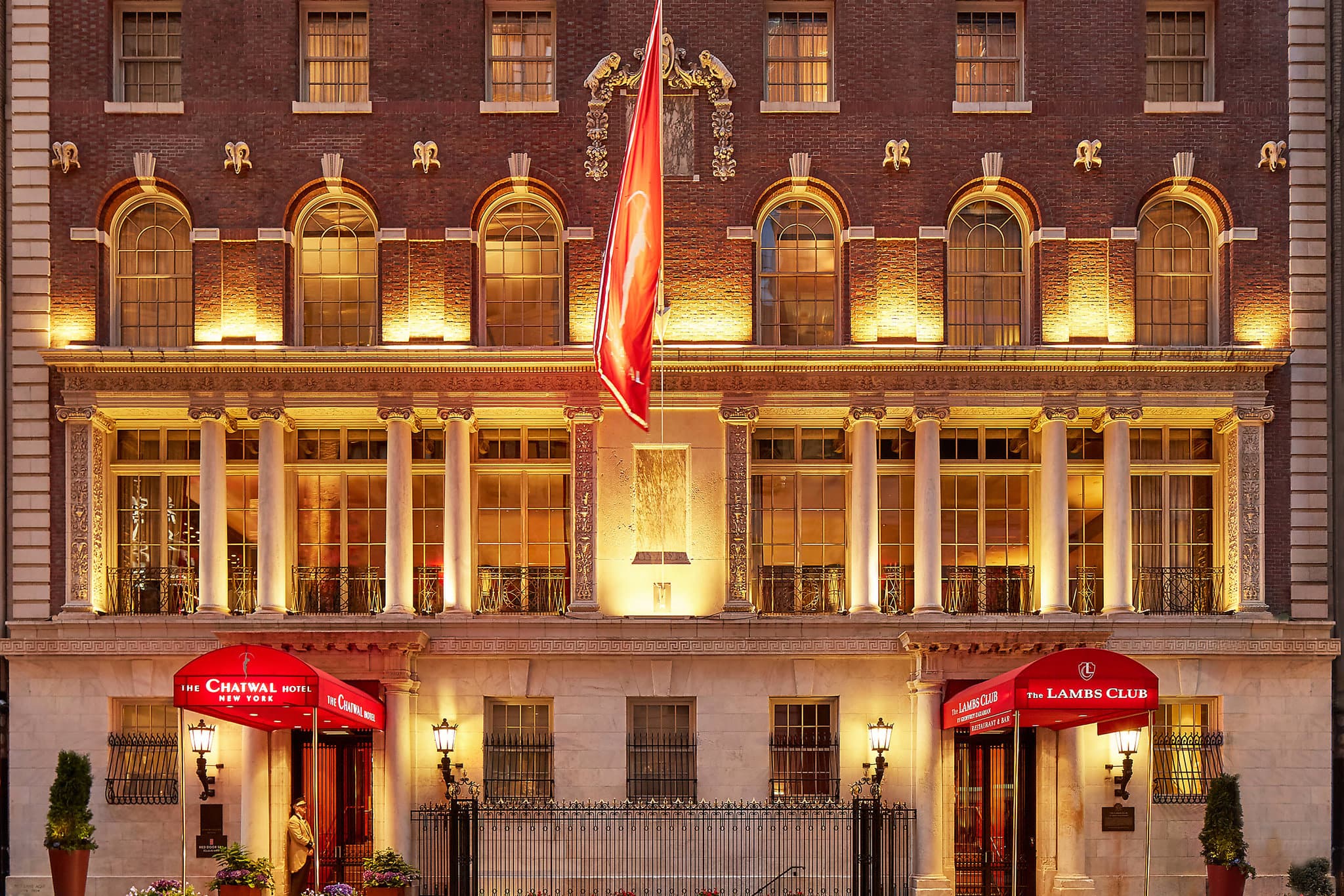 The Chatwal New York facade featuring Stanford White's original limestone design and Art Deco signage.