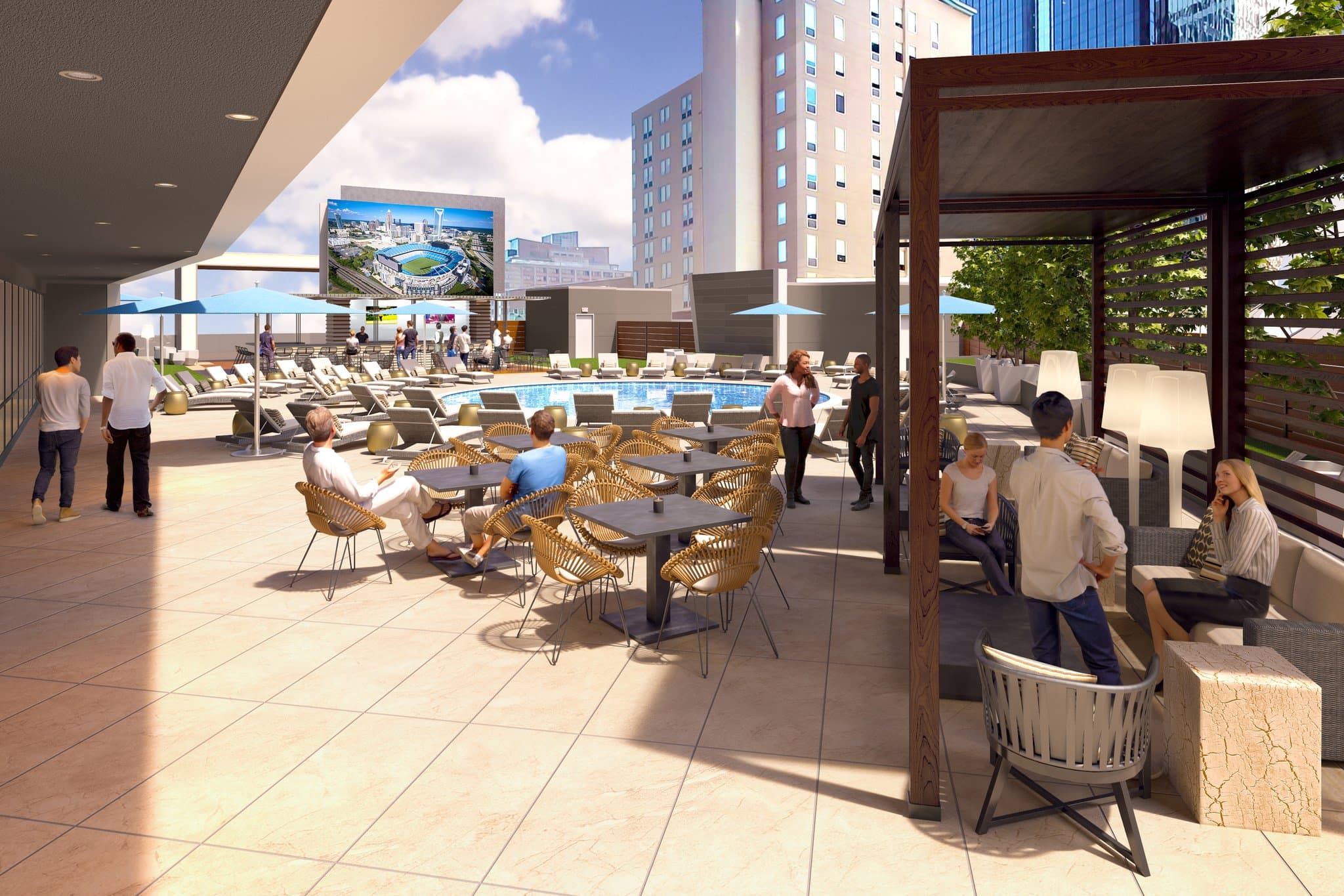 The Coin Bar rooftop pool deck at Omni Charlotte featuring dual large LED screens displaying sports, surrounded by lounge chairs and the city skyline.