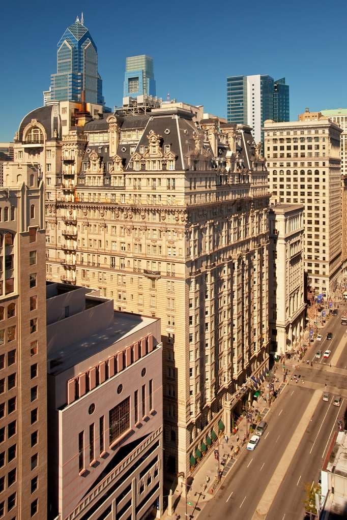 The Bellevue Hotel's Conservatory atrium featuring a dramatic 7-story skylight and restored French Renaissance architecture.