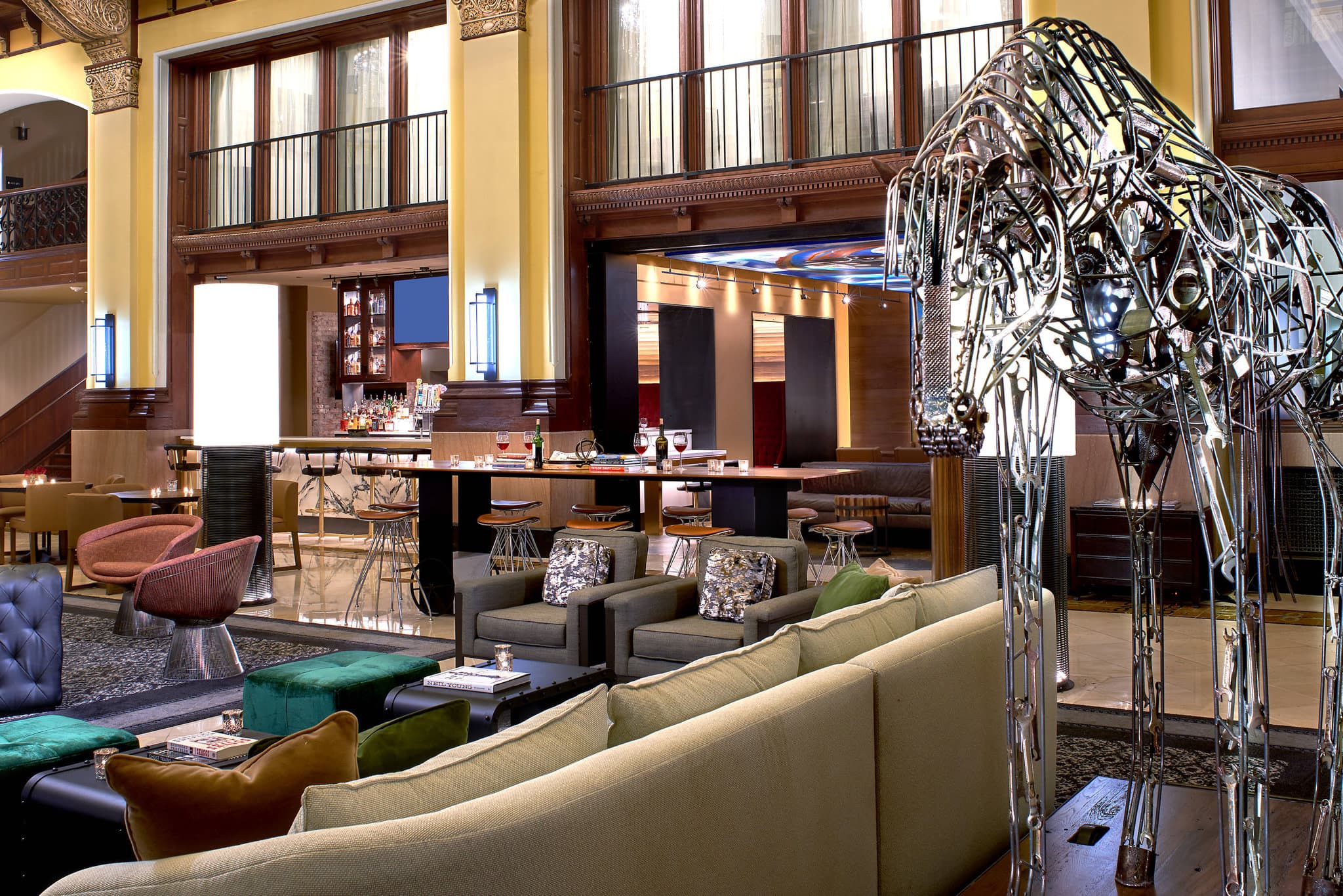 The Union Station Nashville Yards lobby featuring a 65-foot barrel-vaulted stained glass ceiling and Richardsonian Romanesque architecture.