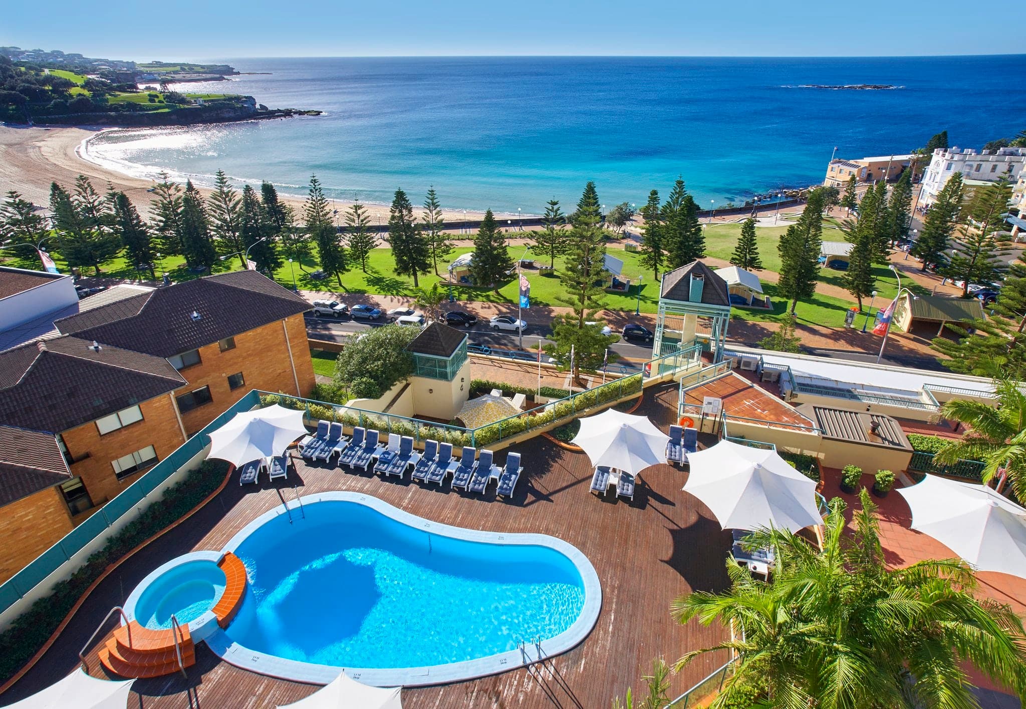 View from InterContinental Sydney Coogee Beach balcony looking out at Wedding Cake Island and the Pacific Ocean.
