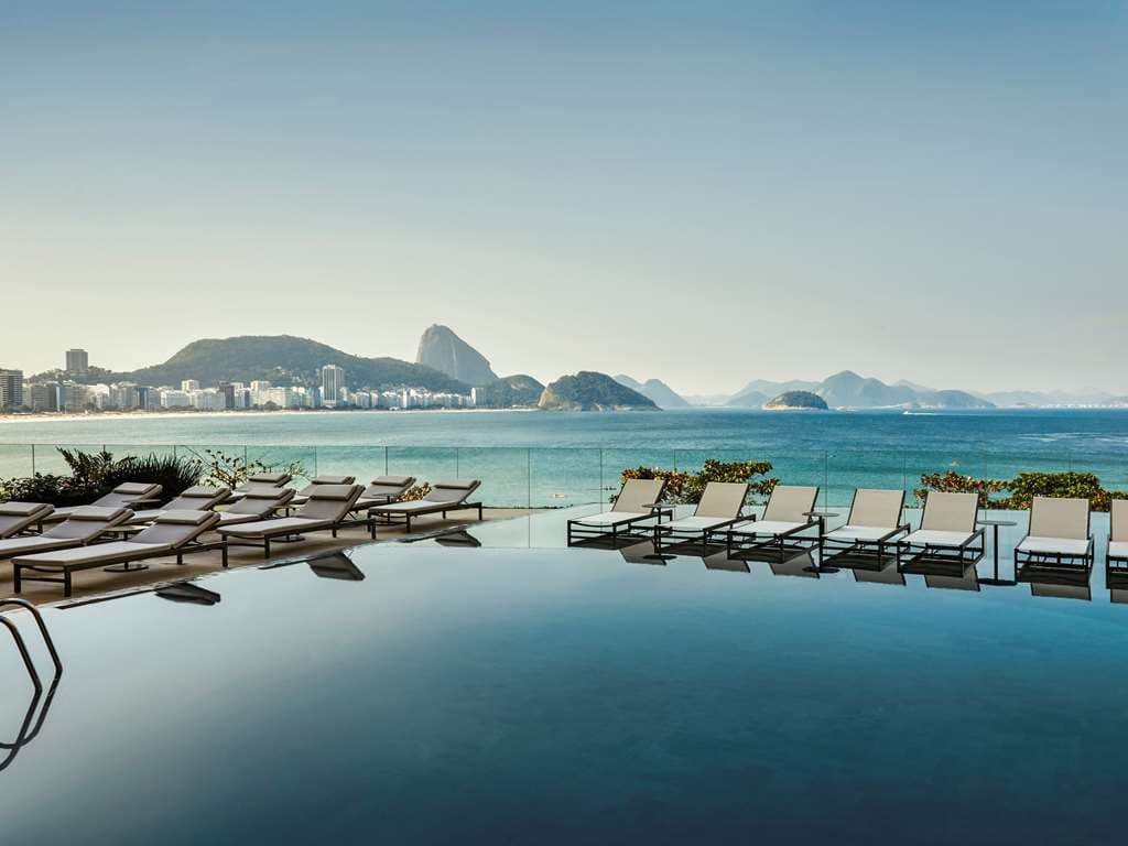 Infinity pool at Fairmont Rio de Janeiro overlooking Copacabana beach and Sugarloaf Mountain.