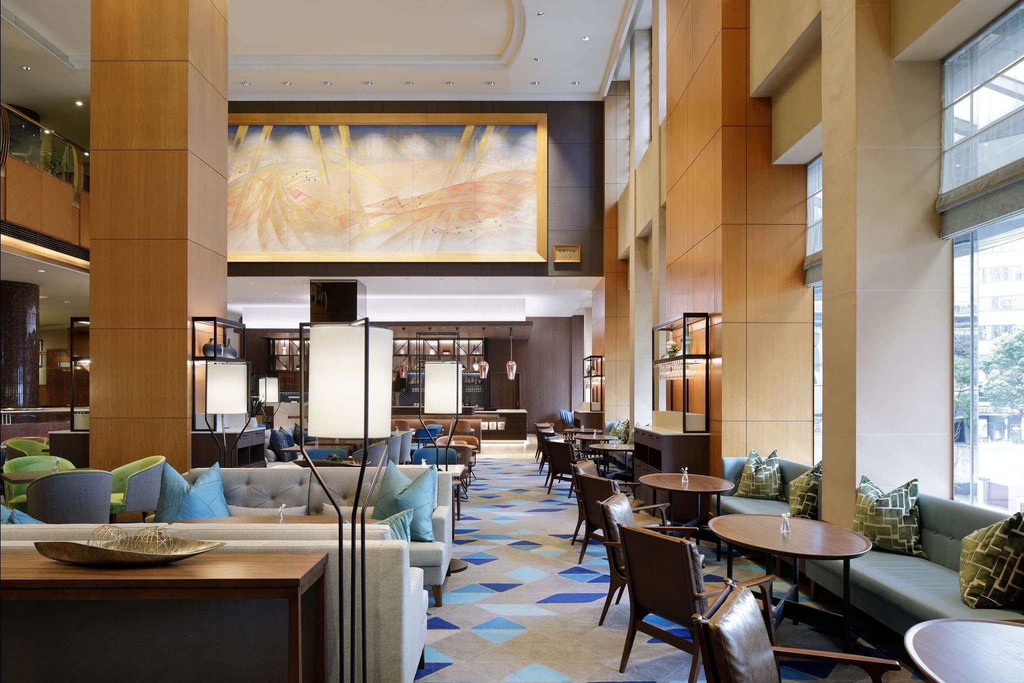 The sweeping staircase and crystal chandelier of the Yokohama Bay Sheraton lobby, exuding classic 1990s luxury.