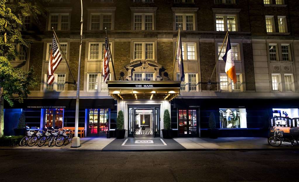 The Mark Hotel Penthouse private terrace overlooking Central Park with outdoor dining setup and manicured landscaping.