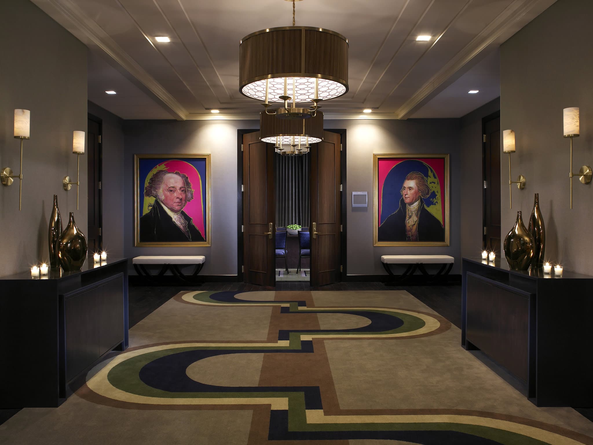 A neon-painted bust of Benjamin Franklin in the Art Deco lobby of Kimpton Hotel Palomar Philadelphia.