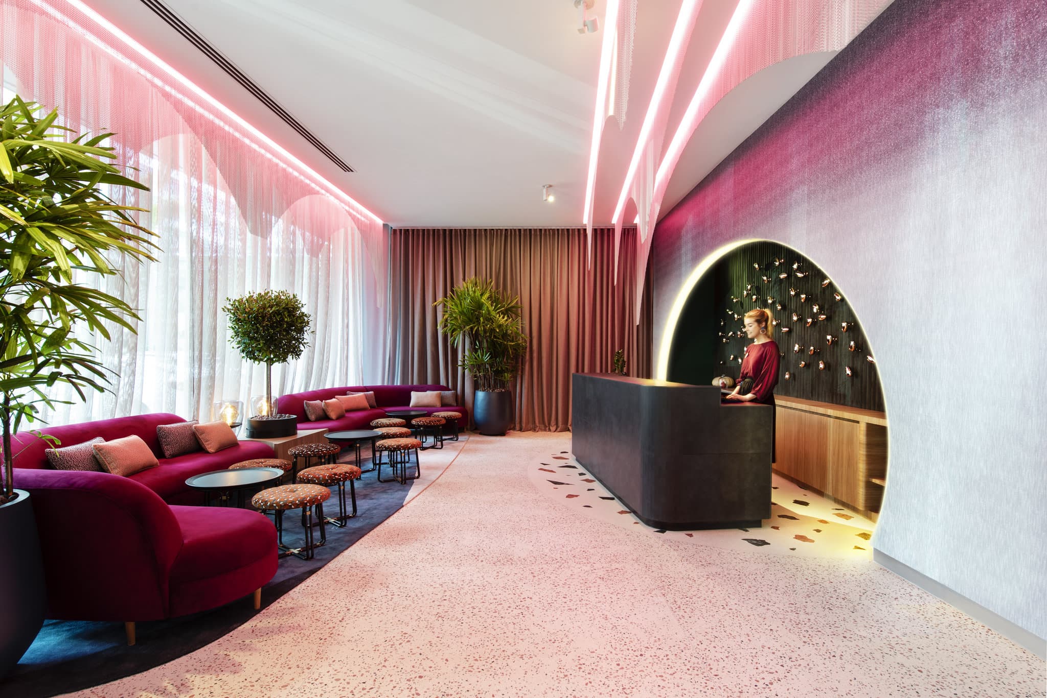 Rooftop pool at Ovolo The Valley Brisbane featuring skyline views and modern lounge seating.
