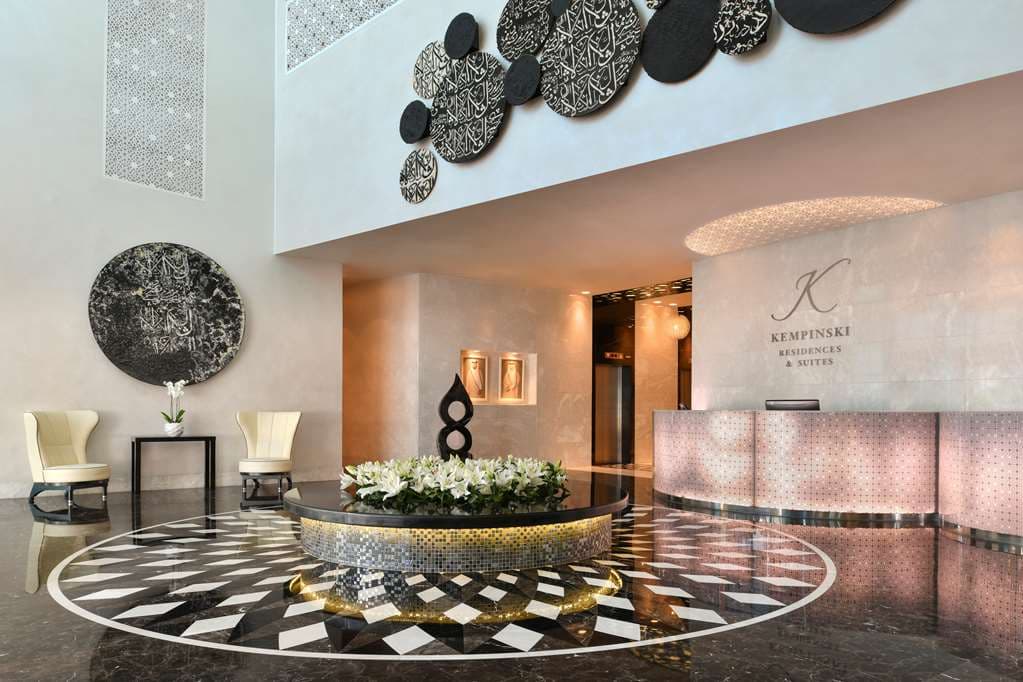 View from Zengo restaurant on the 61st floor showing Doha skyline and sea with feather motif decor.