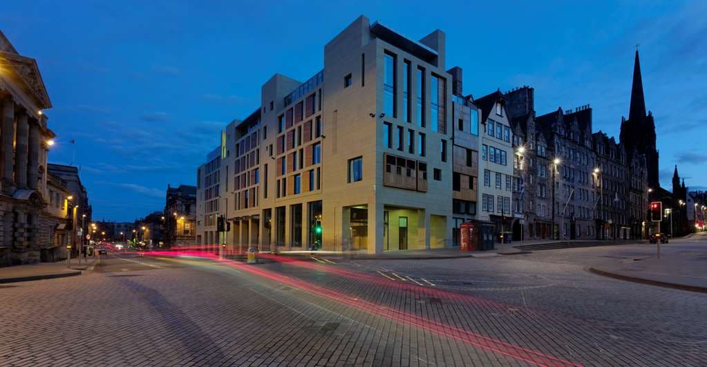 The Radisson Collection Edinburgh hotel entrance featuring giant black-and-white mosaic vases and contemporary design elements.