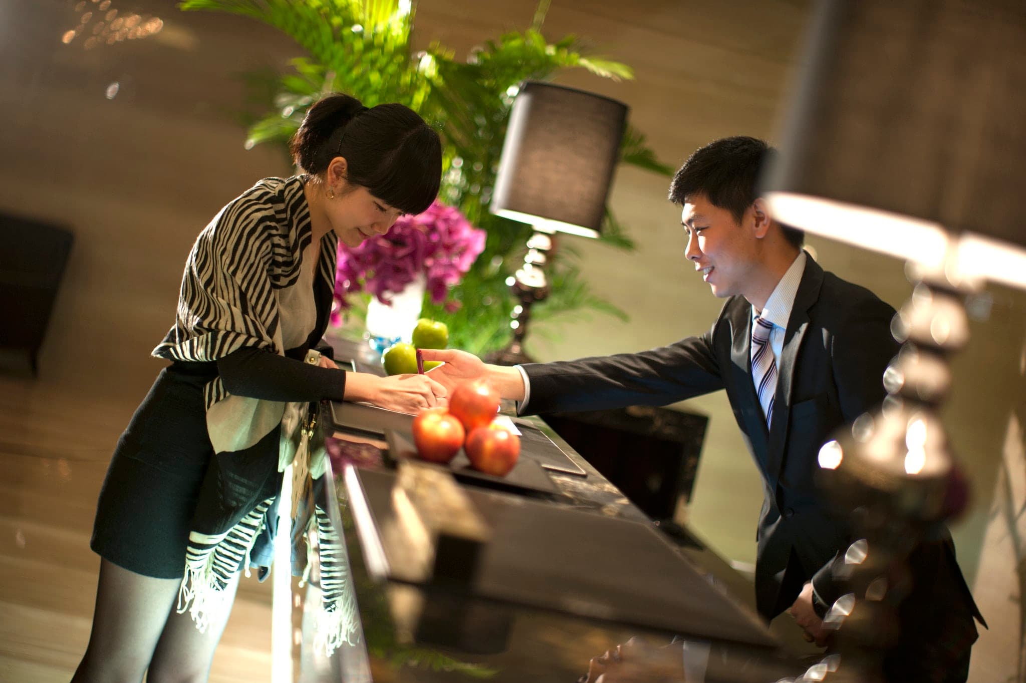 Elegant facade and luxurious lobby of Crowne Plaza Xi'an, a 5-star foreigner-friendly hotel in China.