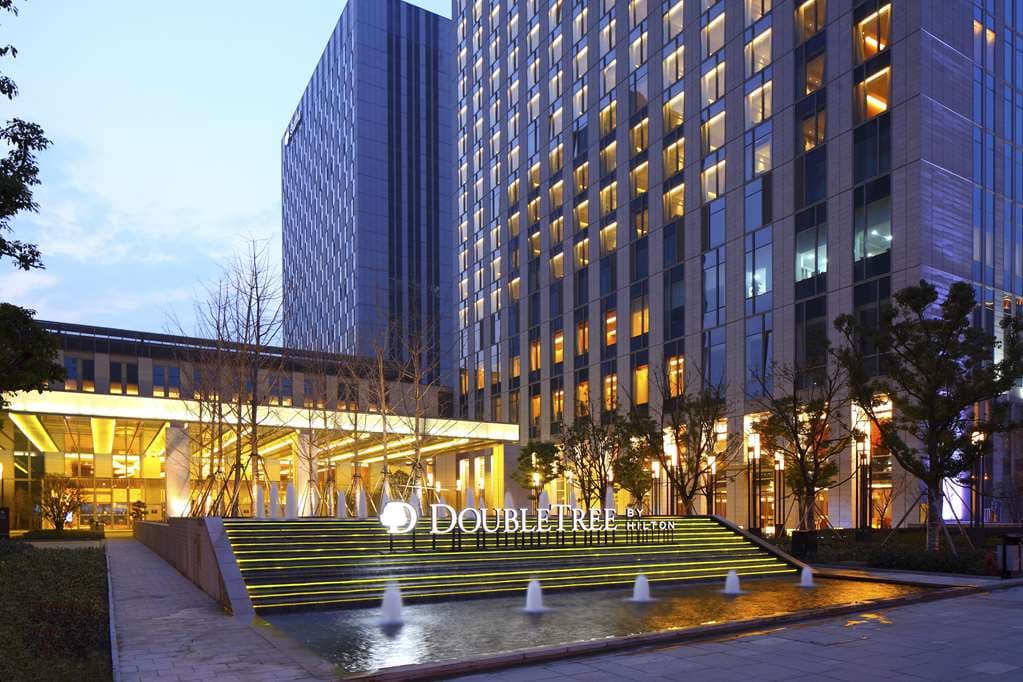 DoubleTree by Hilton Hangzhou East exterior with modern tower design near metro and shopping in Hangzhou