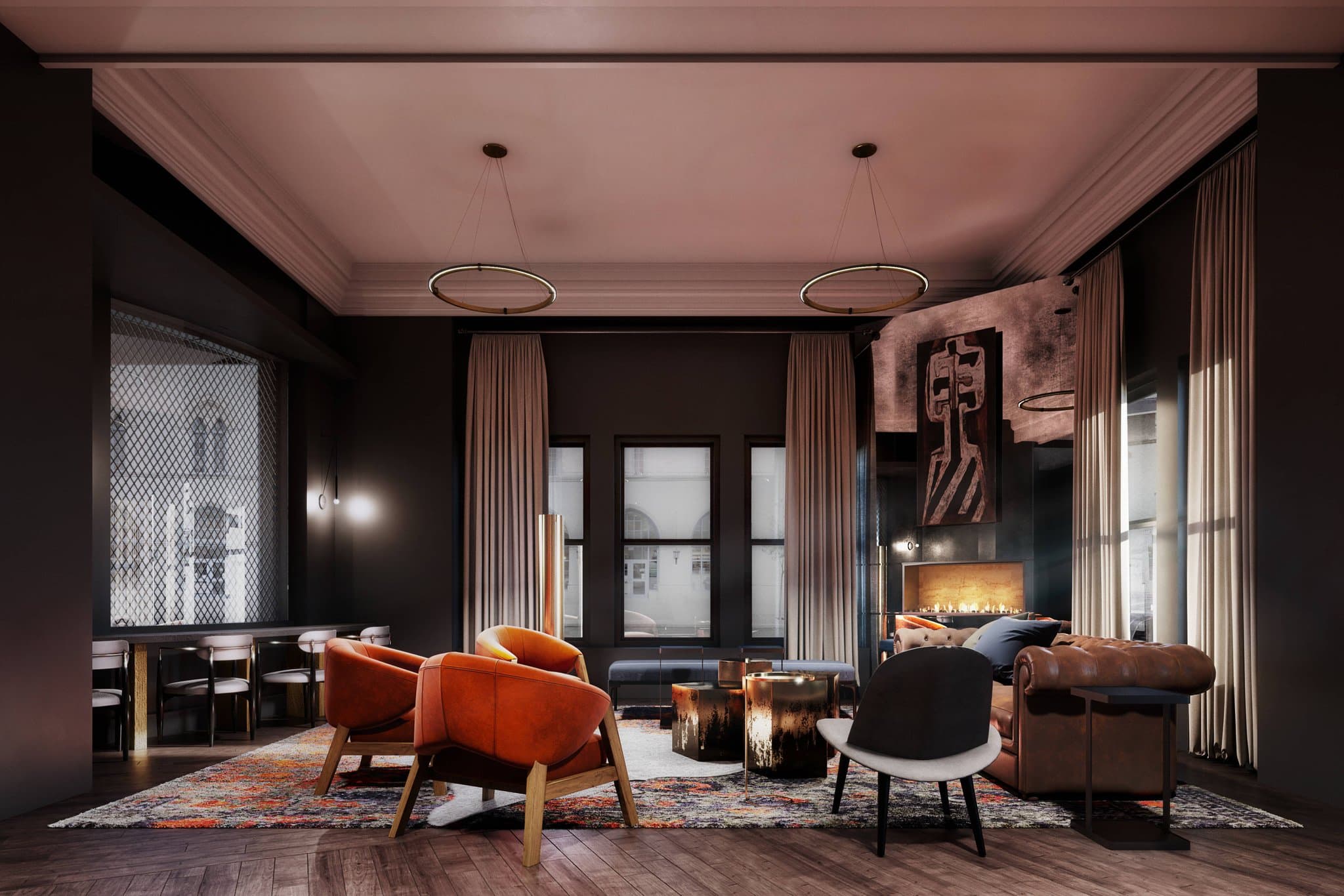 The Industrialist Hotel lobby featuring machinery-inspired chandeliers, dark walls, and a preserved historic marble staircase.