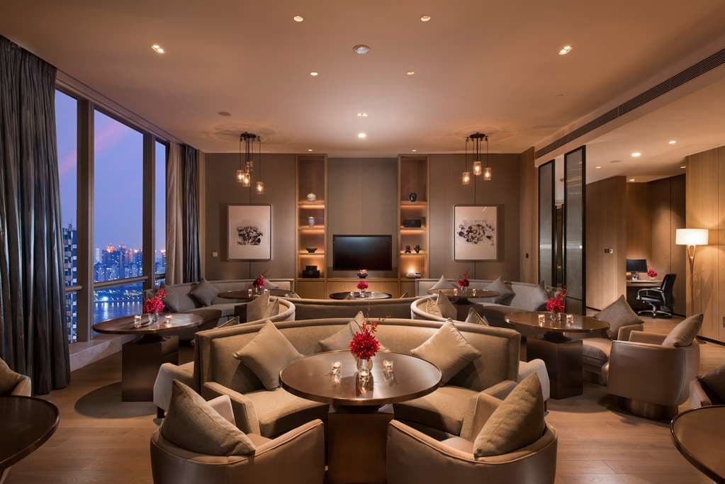 Luxurious guest room at Conrad Guangzhou with sweeping views of the Pearl River and Canton Tower.