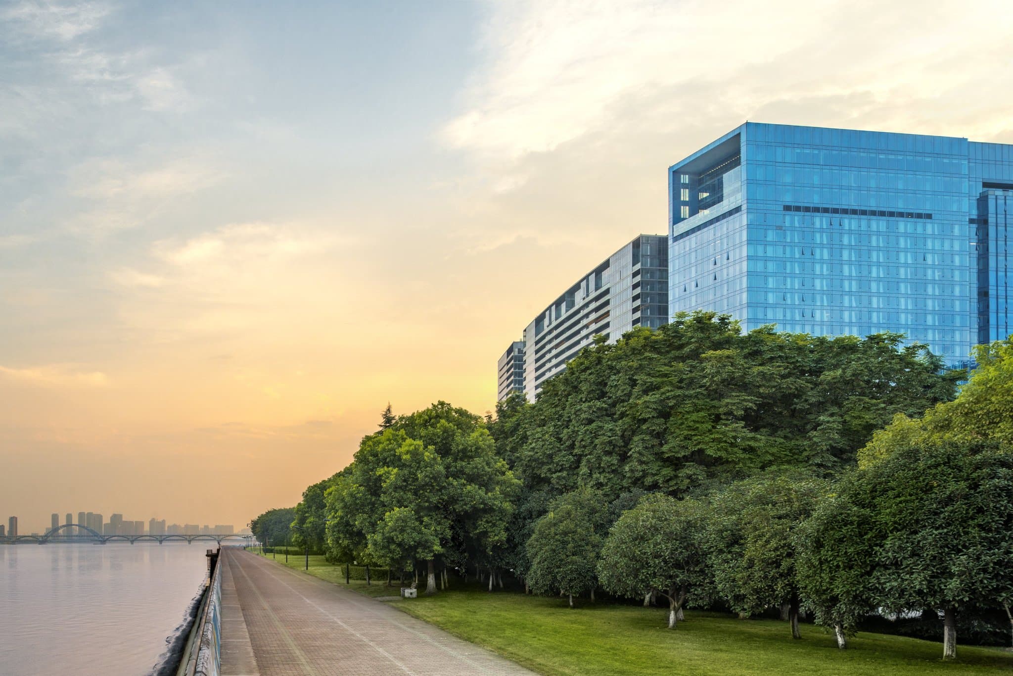 Spacious luxury room at The Azure Qiantang Hangzhou with city views.