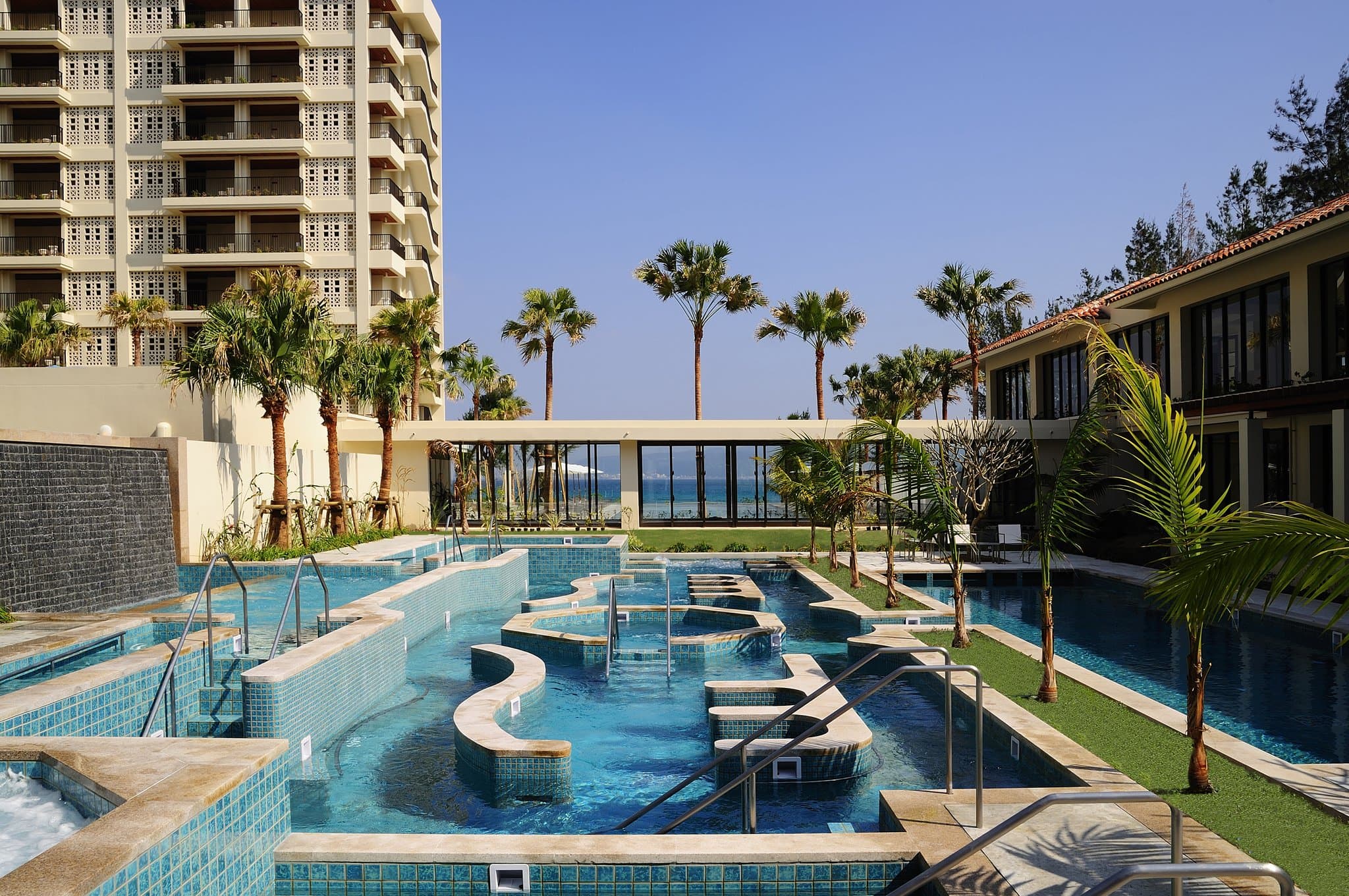 The Terrace Club at Busena's outdoor heated seawater Thalasso Pool with infinity edge overlooking the ocean.