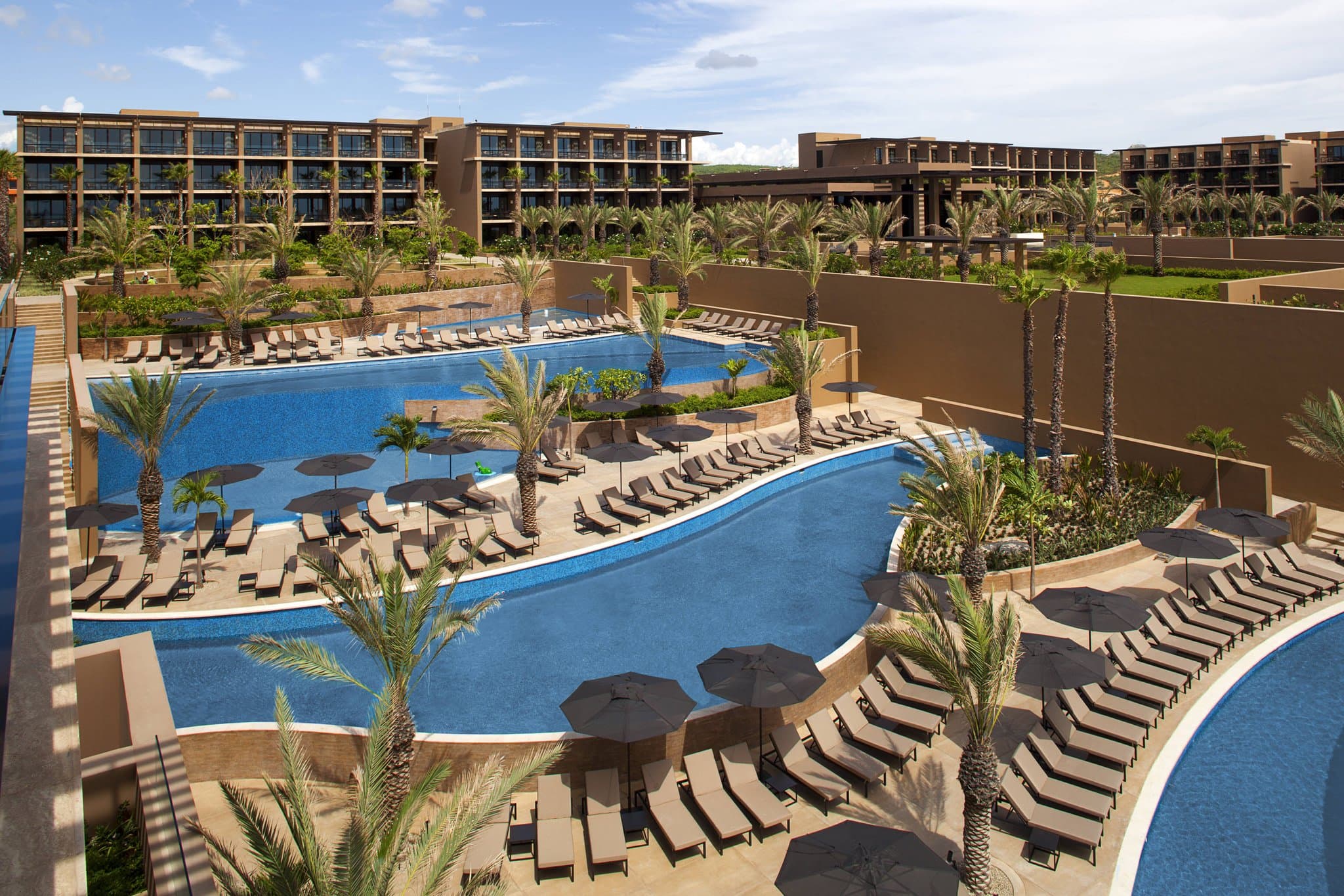 Jim Olson designed brutalist concrete hallway at JW Marriott Los Cabos framing the deep blue Sea of Cortez.
