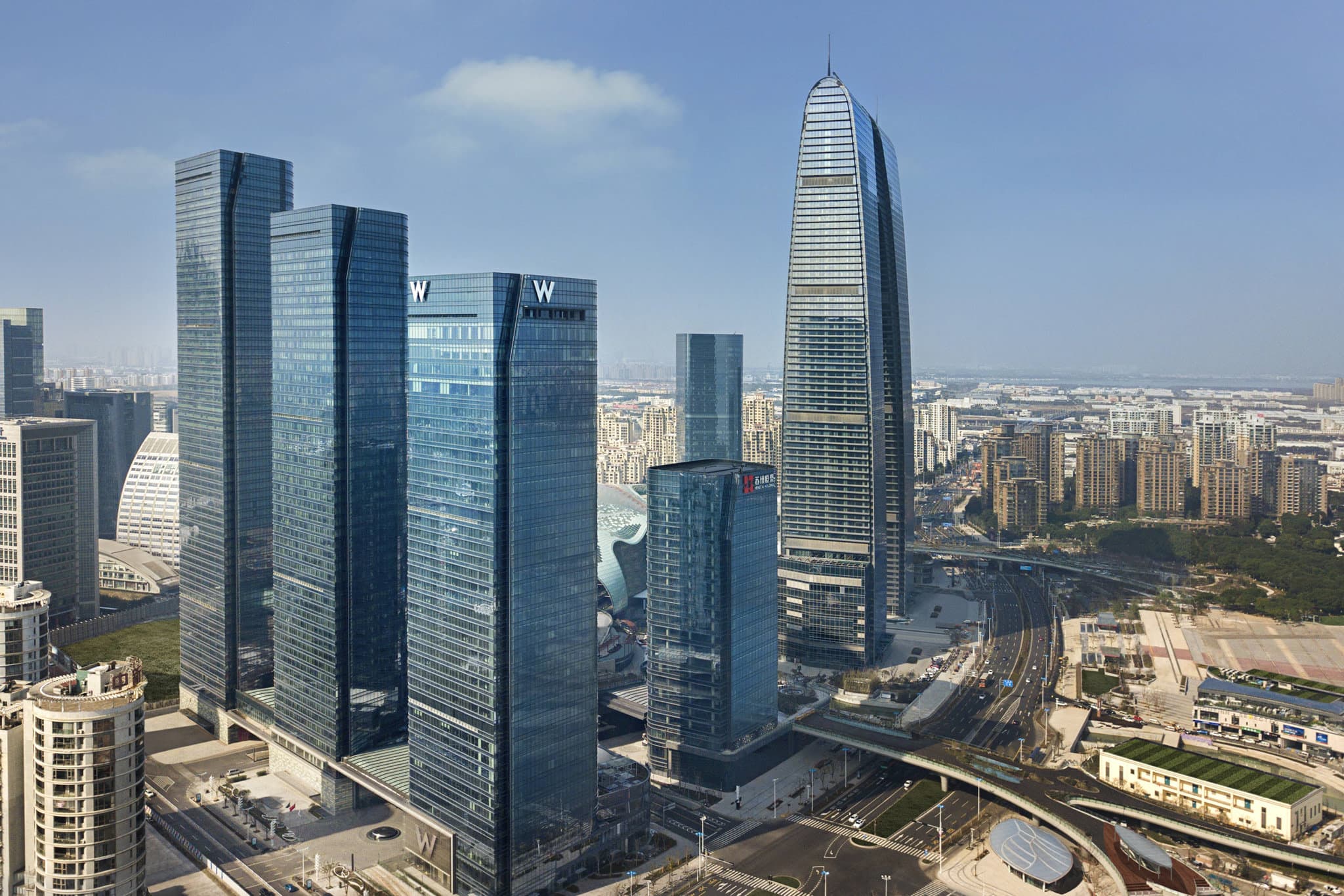 Luxury room at W Suzhou featuring modern boutique design and spectacular views of Jinji Lake and the Gate to the East.
