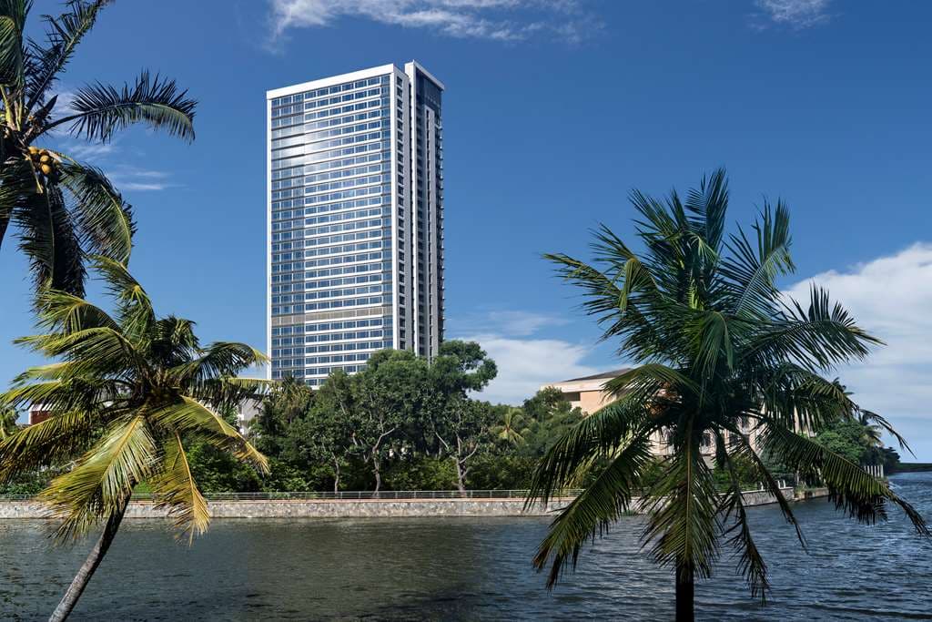 View from Shangri-La Colombo guest room featuring a deep window ledge overlooking the Lotus Tower and Galle Face Green.