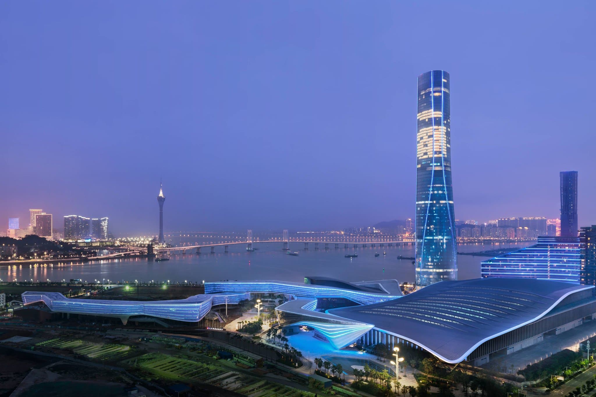 Luxurious St. Regis Zhuhai room featuring panoramic skyline views of Macau and the bay.