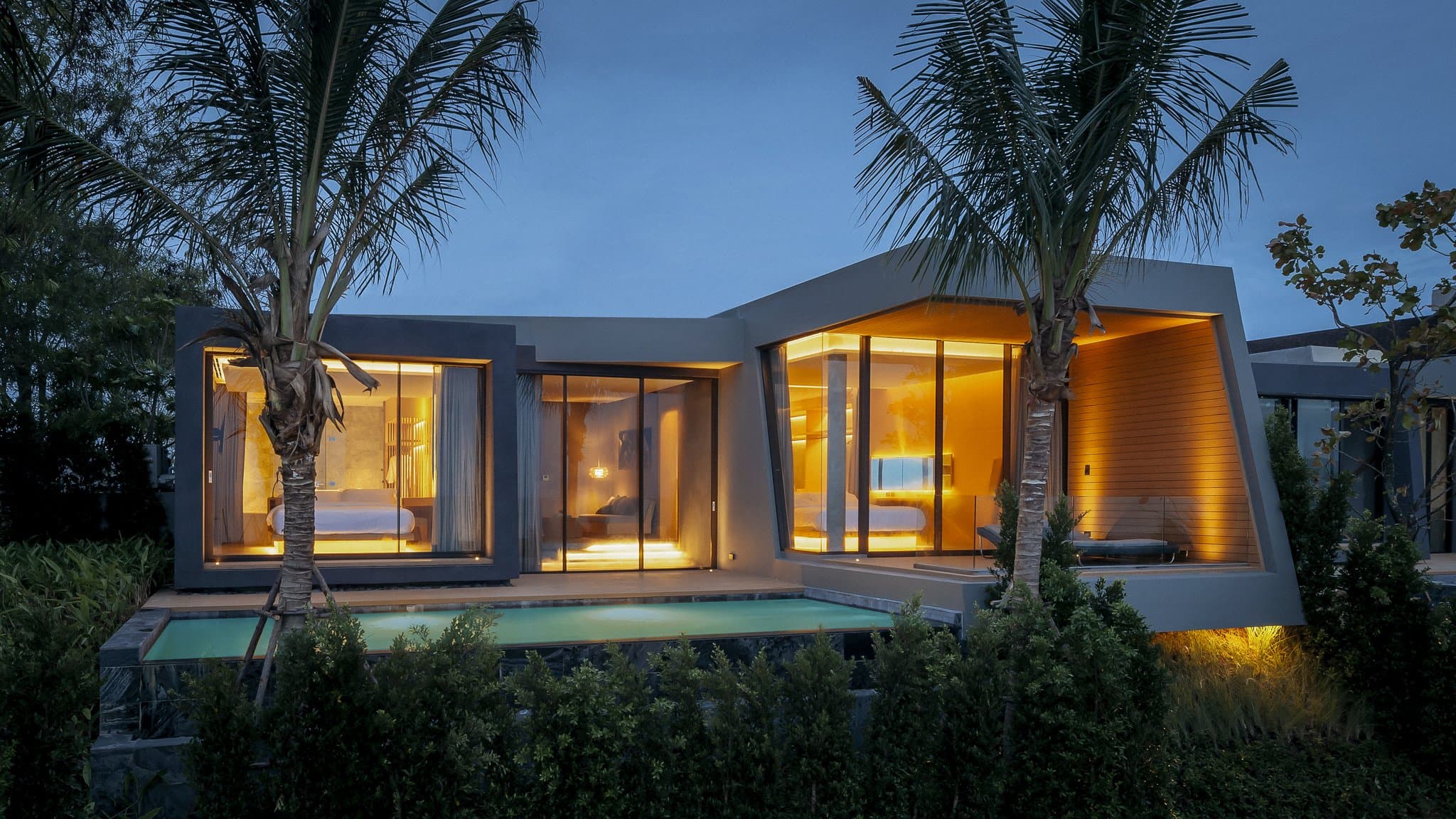 Modern brutalist stone villas at MASON Pattaya featuring private pools and geometric architecture.