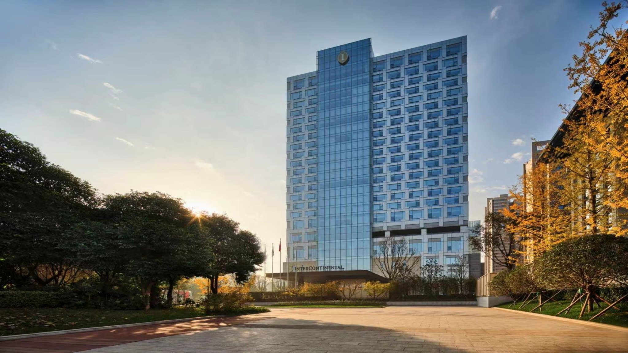 Grand exterior and luxurious lobby of the Intercontinental Xi'an North hotel near the high-speed rail station.