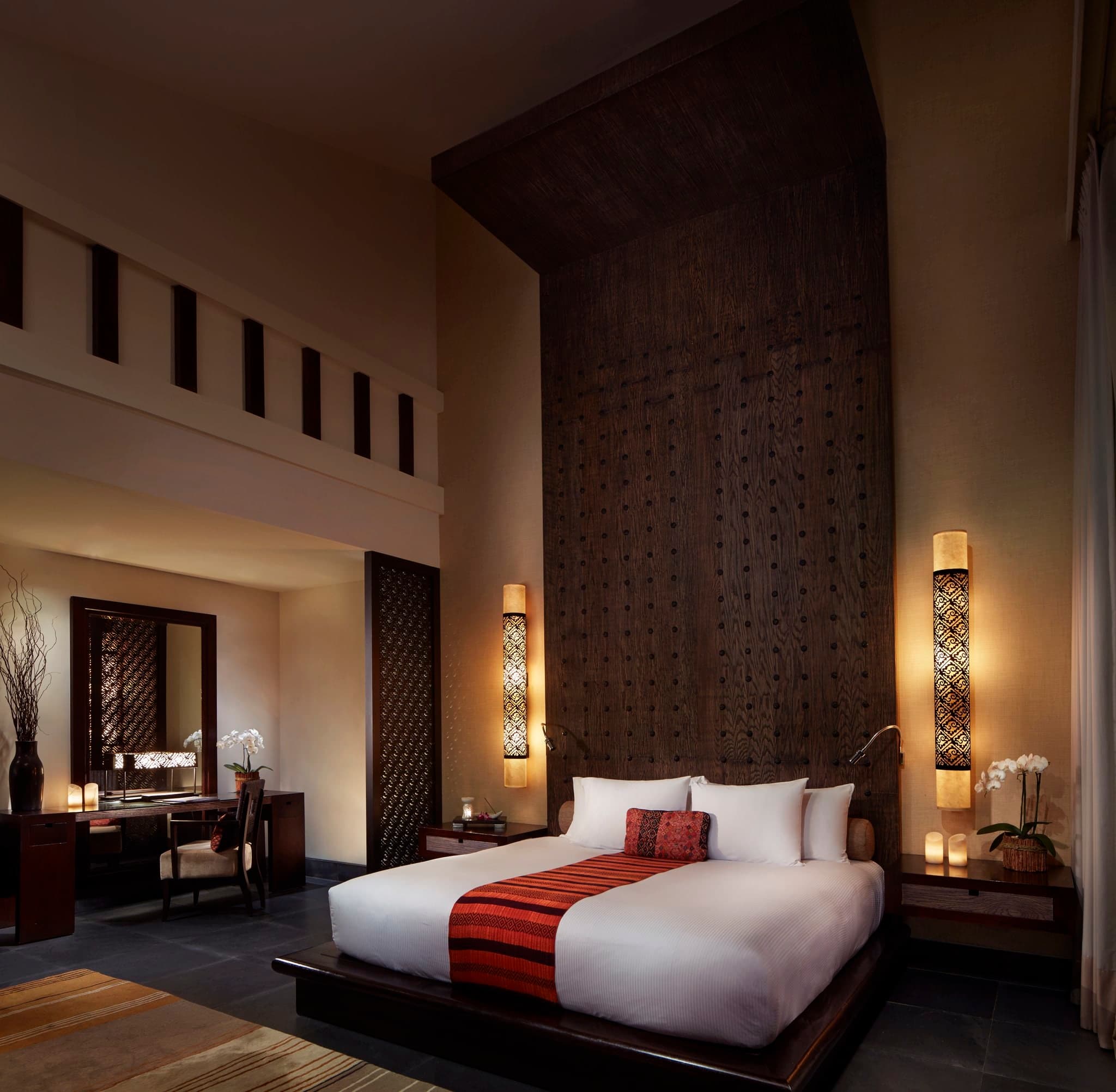 A luxurious private villa pool at Banyan Tree Mayakoba overlooking the mangroves at sunset.